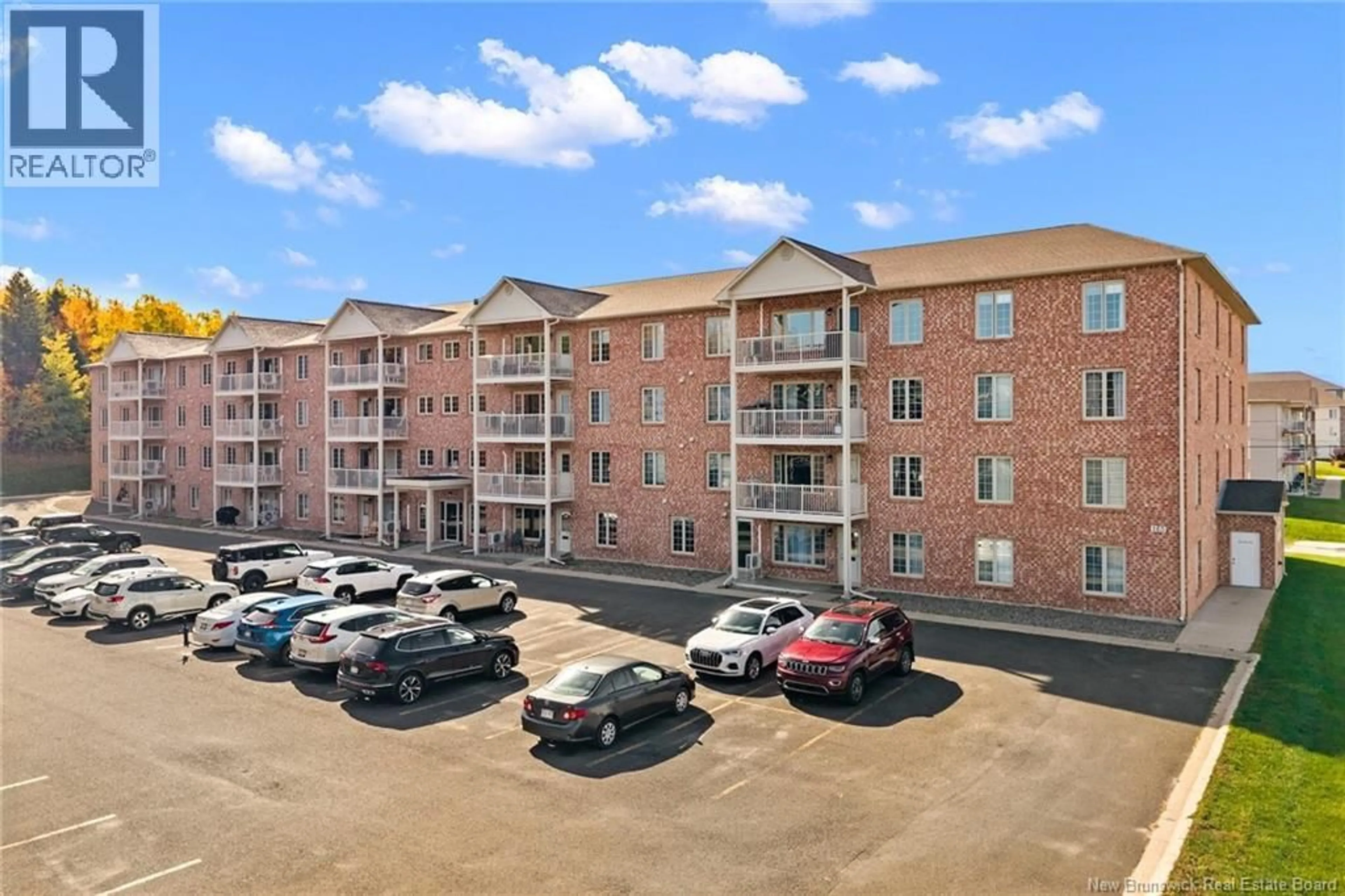 A pic from outside/outdoor area/front of a property/back of a property/a pic from drone, building for 212 - 165 VALCOUR DRIVE, Fredericton New Brunswick E3C0H5