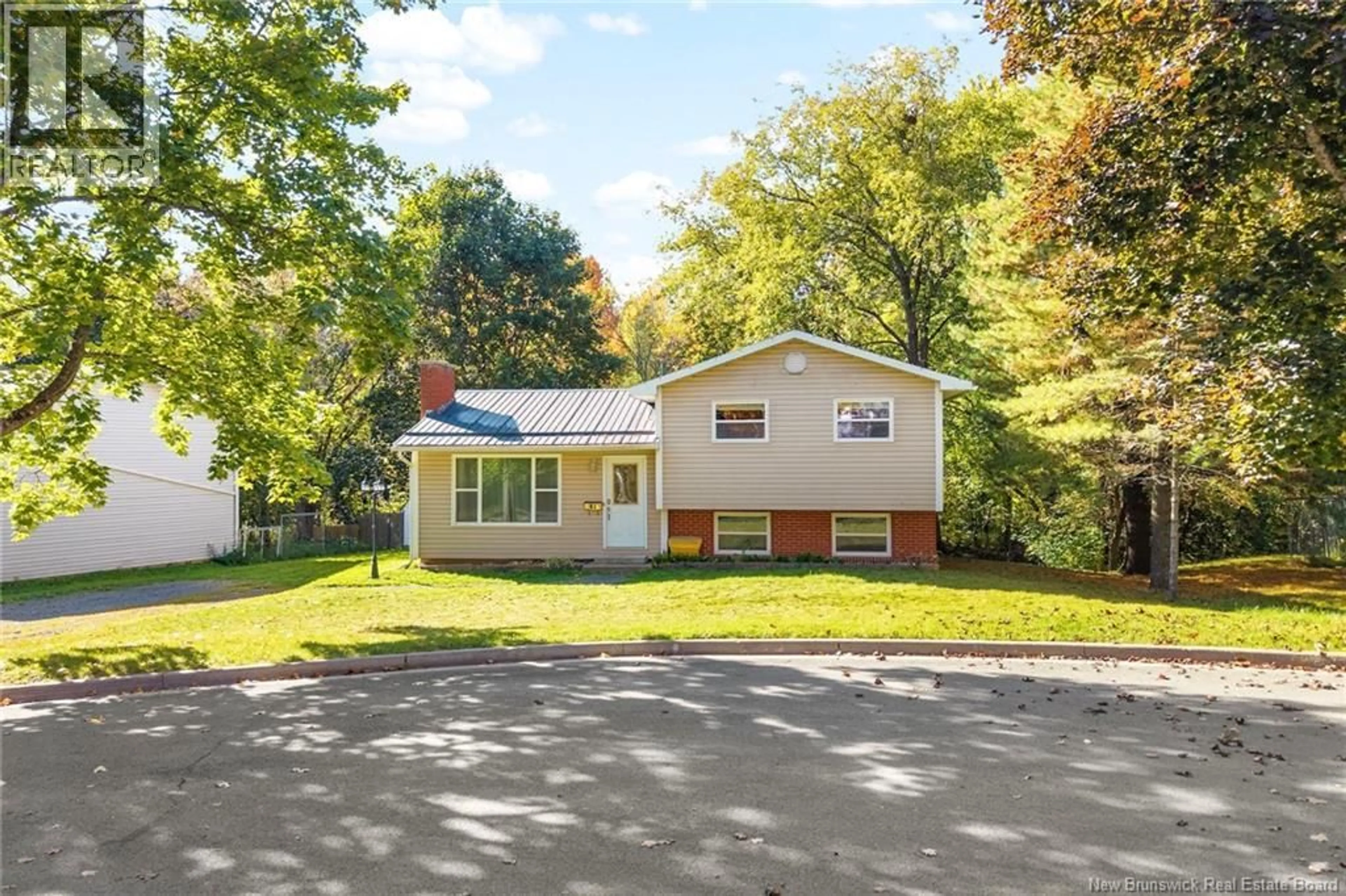 Home with vinyl exterior material, street for 30 FLETCHER COURT, Fredericton New Brunswick E3A4T4