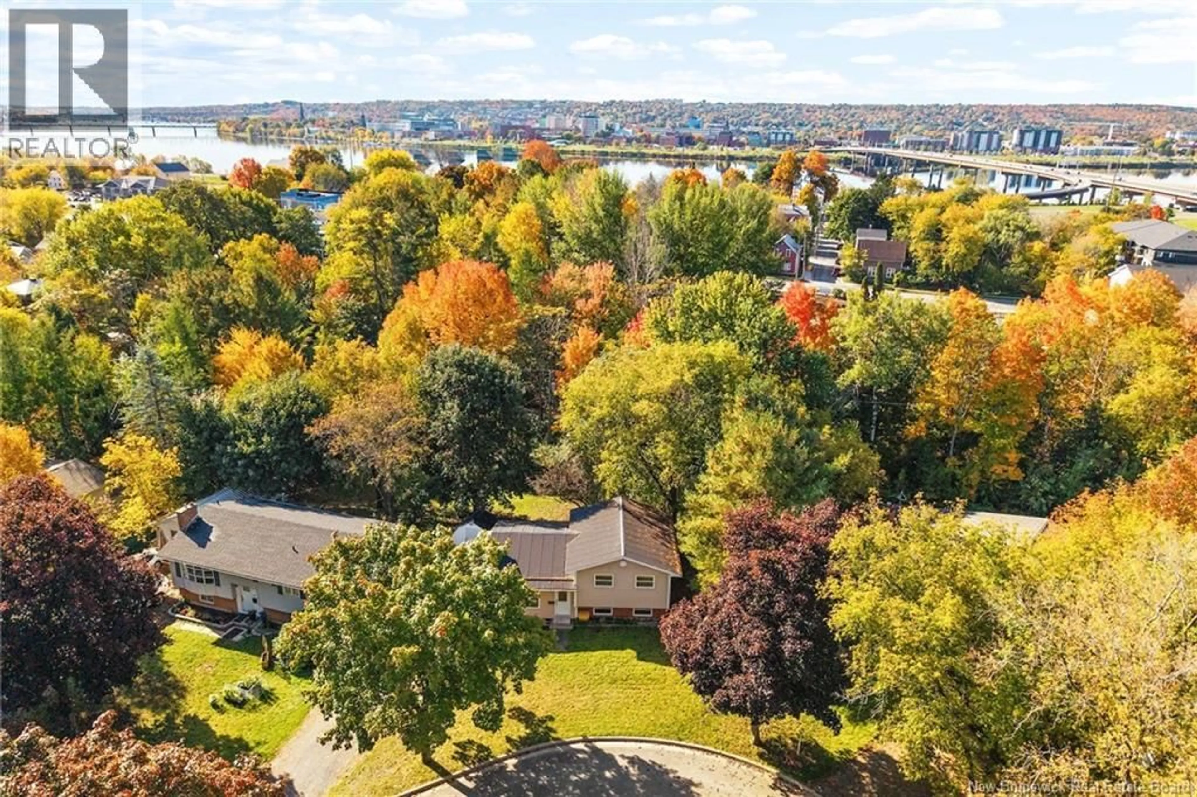A pic from outside/outdoor area/front of a property/back of a property/a pic from drone, water/lake/river/ocean view for 30 FLETCHER COURT, Fredericton New Brunswick E3A4T4
