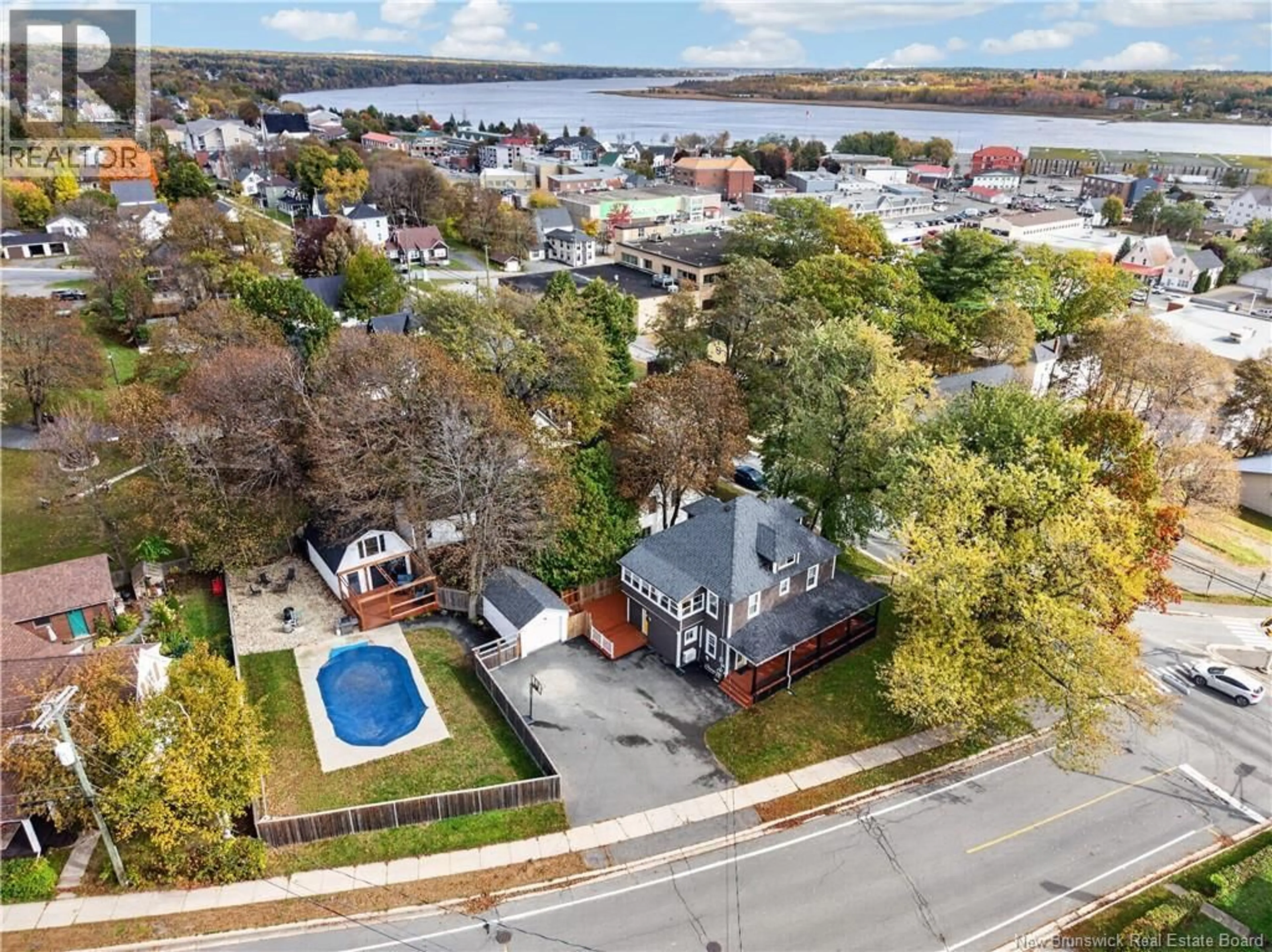 A pic from outside/outdoor area/front of a property/back of a property/a pic from drone, water/lake/river/ocean view for 507 KING GEORGE HWY, Miramichi New Brunswick E1V4M2