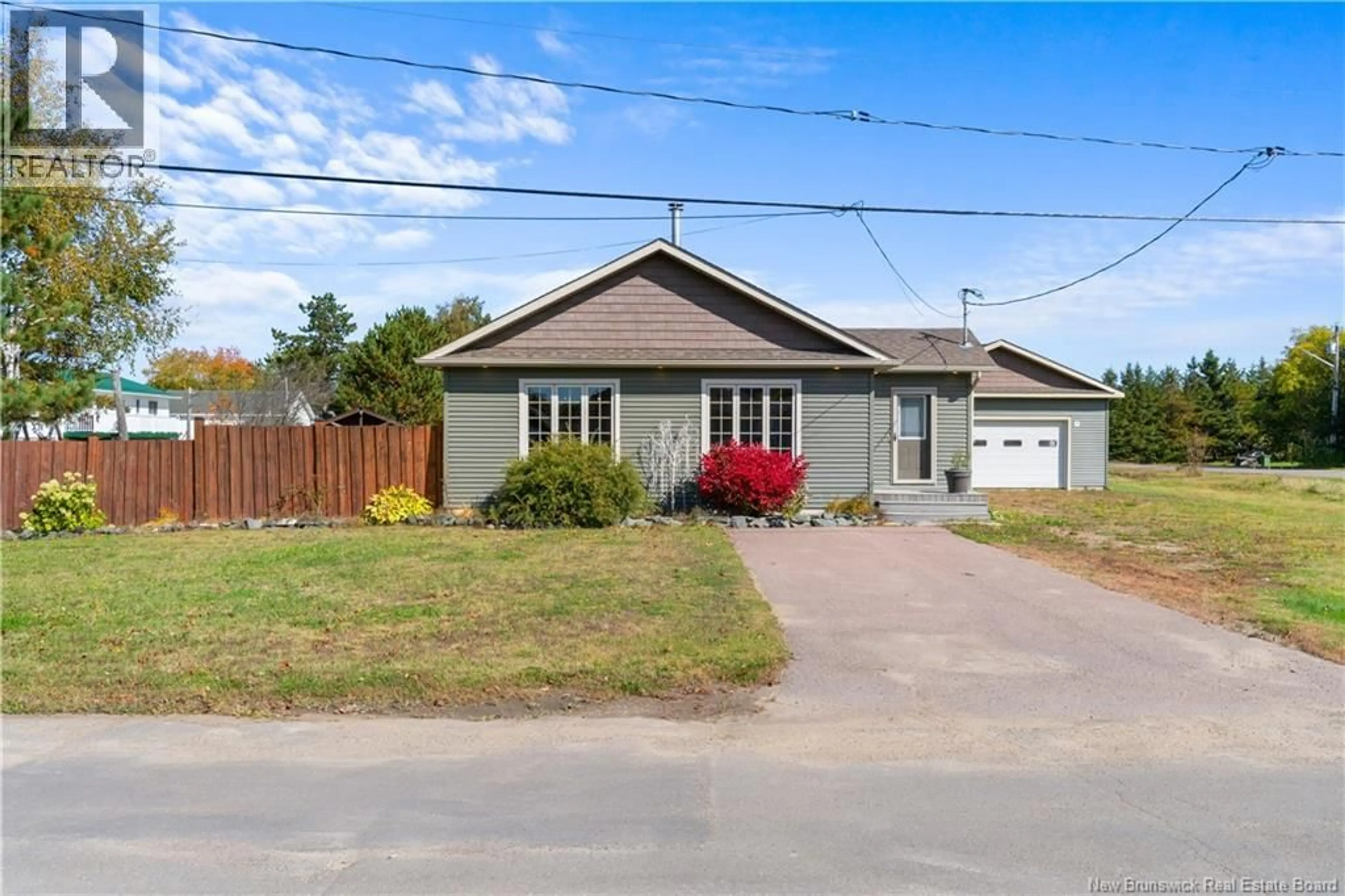 A pic from outside/outdoor area/front of a property/back of a property/a pic from drone, street for 7 SOLEIL LEVANT, Saint-Louis-De-Kent New Brunswick E4X1H4