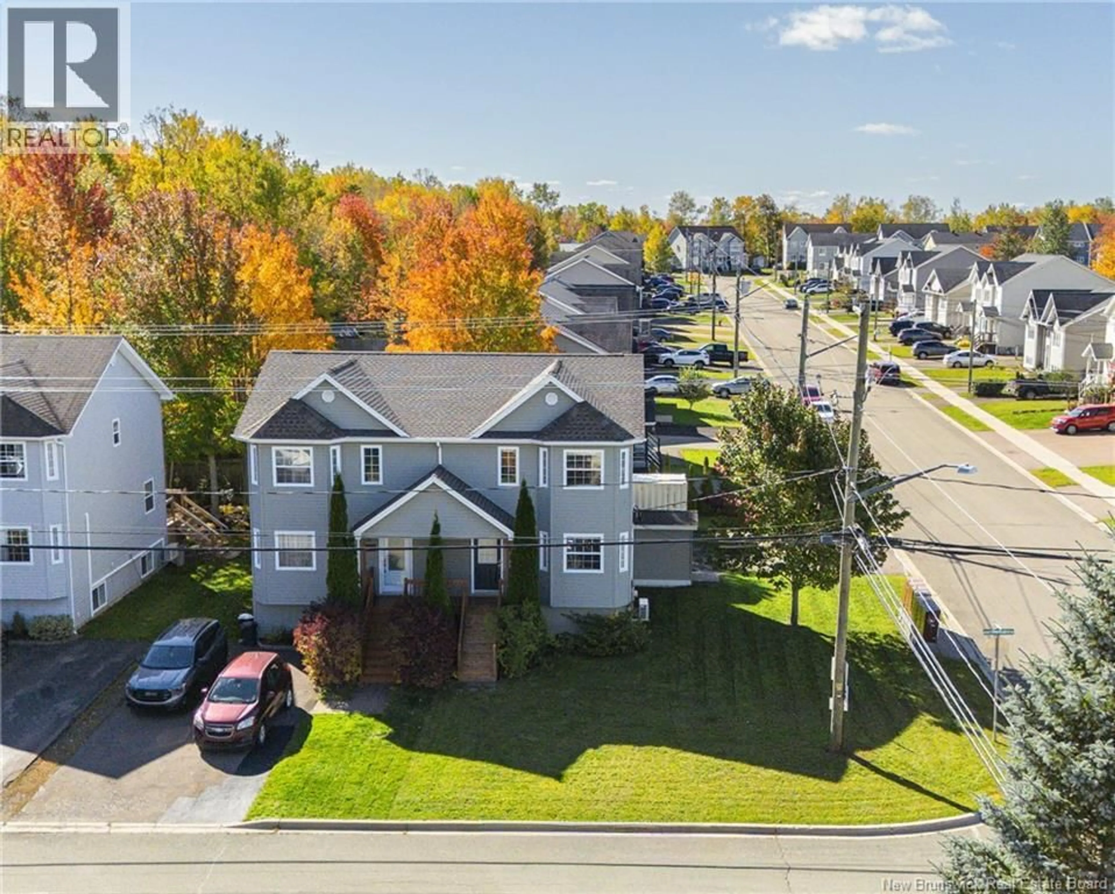 A pic from outside/outdoor area/front of a property/back of a property/a pic from drone, street for 218 GLENCAIRN DRIVE, Moncton New Brunswick E1G5N8