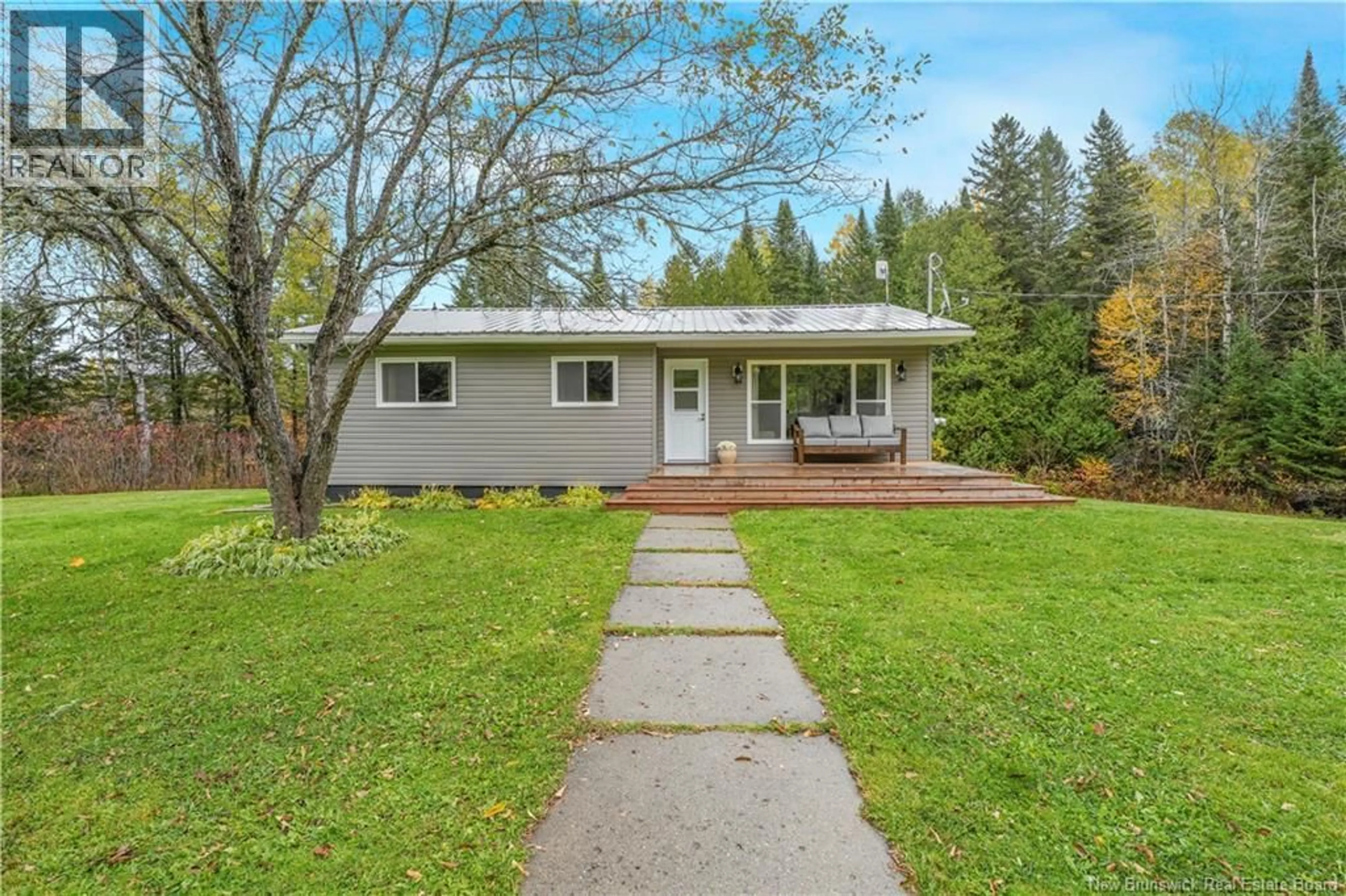 Home with vinyl exterior material, street for 385 CHARLESTON ROAD, Charleston New Brunswick E7K1X3