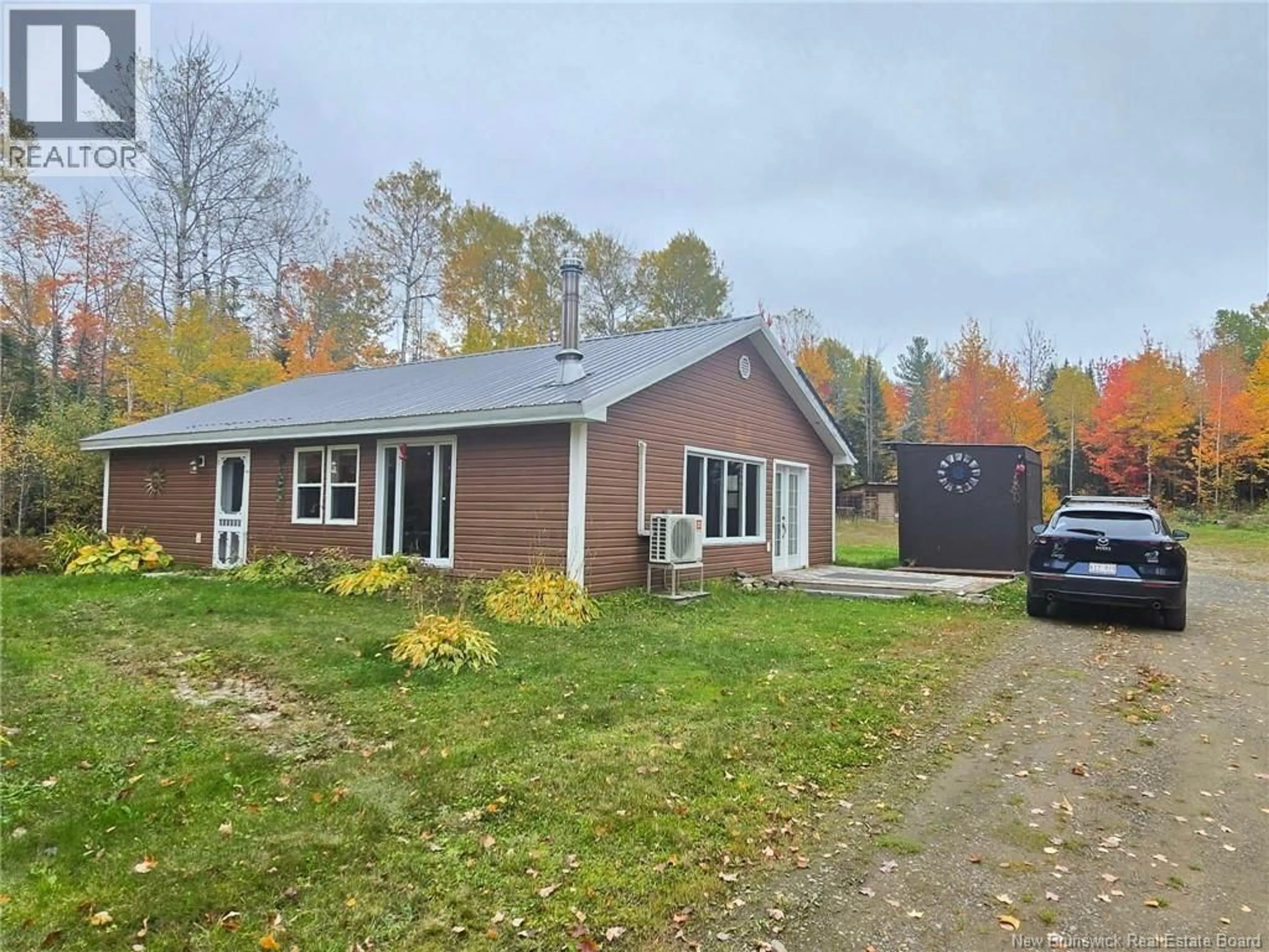 A pic from outside/outdoor area/front of a property/back of a property/a pic from drone, street for 275 CHAMBERLAIN SETTLEMENT, Chamberlain Settlement New Brunswick E2A6G9