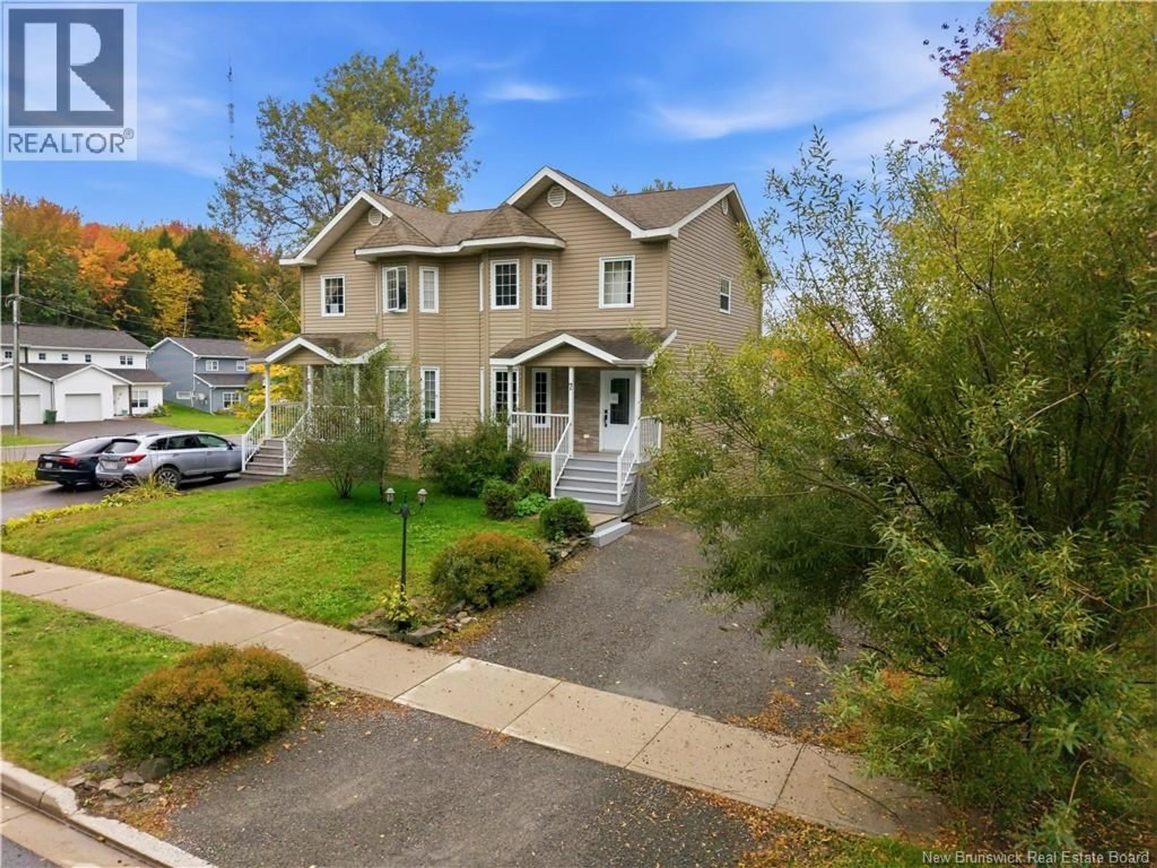 A pic from outside/outdoor area/front of a property/back of a property/a pic from drone, street for 7 KIERRA, Fredericton New Brunswick E3A6S3