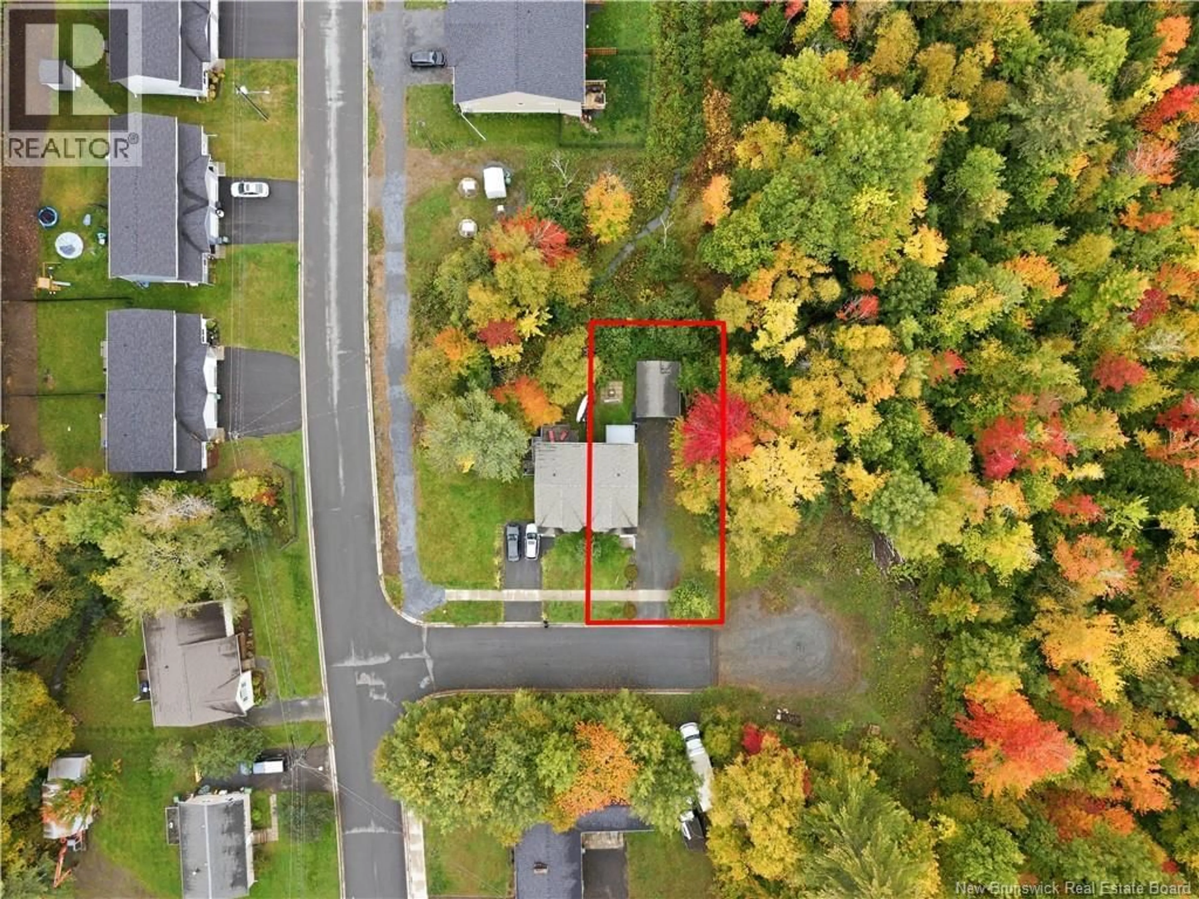 A pic from outside/outdoor area/front of a property/back of a property/a pic from drone, street for 7 KIERRA, Fredericton New Brunswick E3A6S3