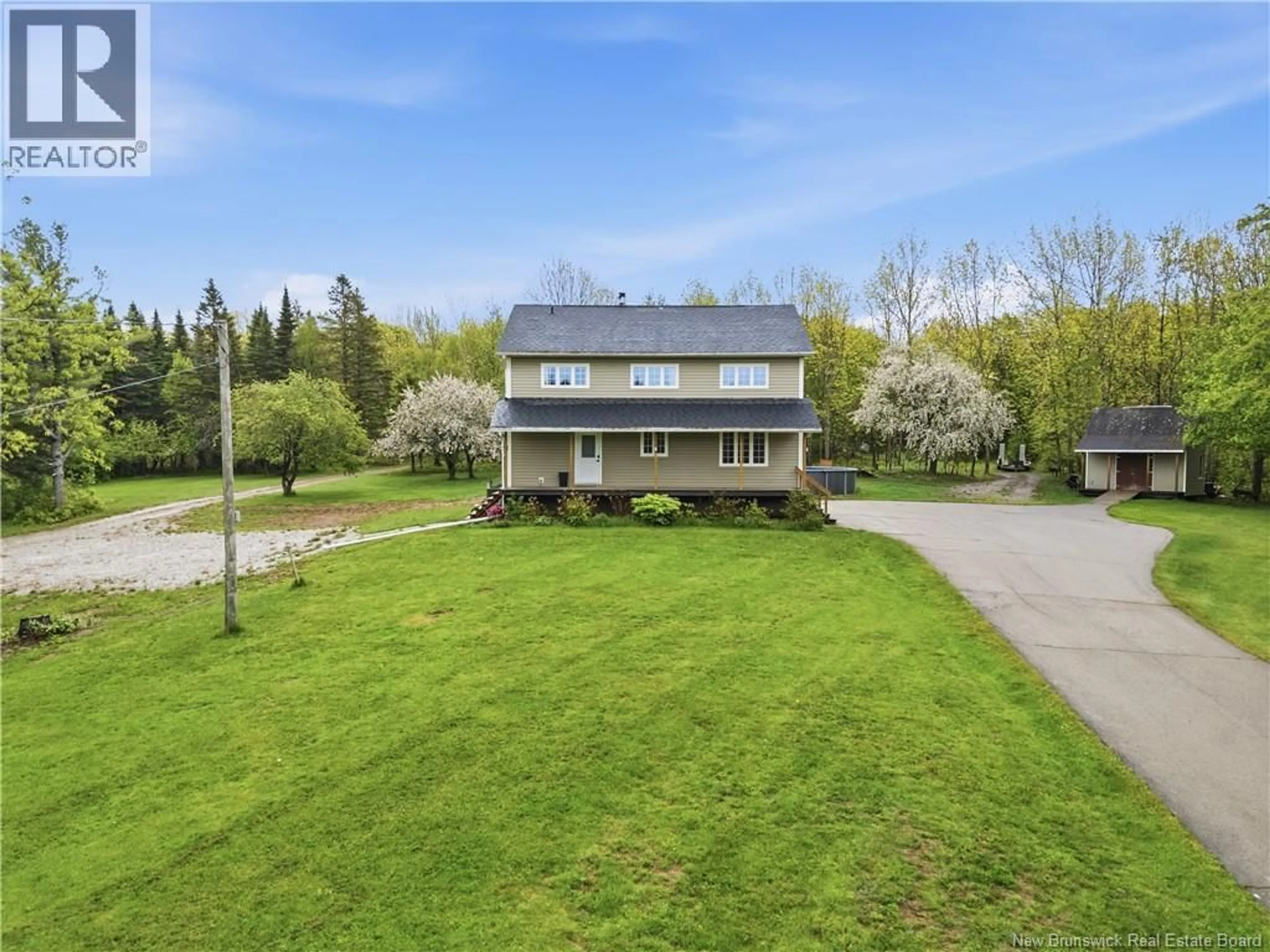 A pic from outside/outdoor area/front of a property/back of a property/a pic from drone, street for 225 QUIRK ROAD, Wards Creek New Brunswick E4E4P1