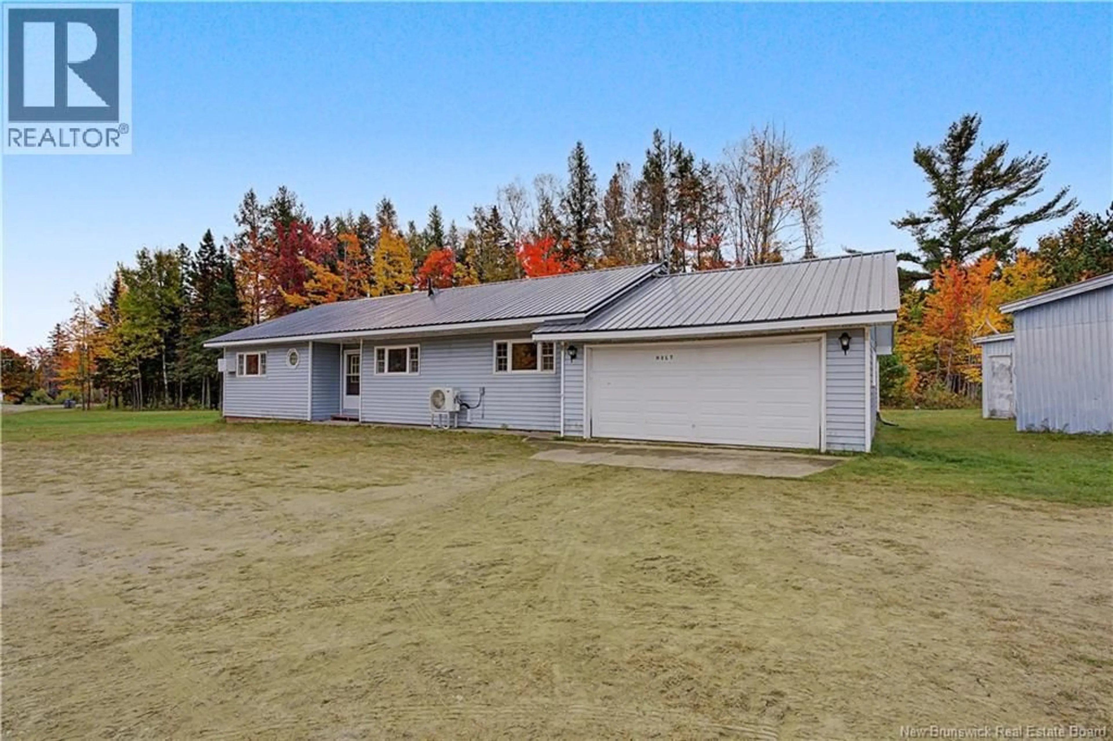 A pic from outside/outdoor area/front of a property/back of a property/a pic from drone, unknown for 12823 RTE 8, Smith Crossing New Brunswick E9B1T7
