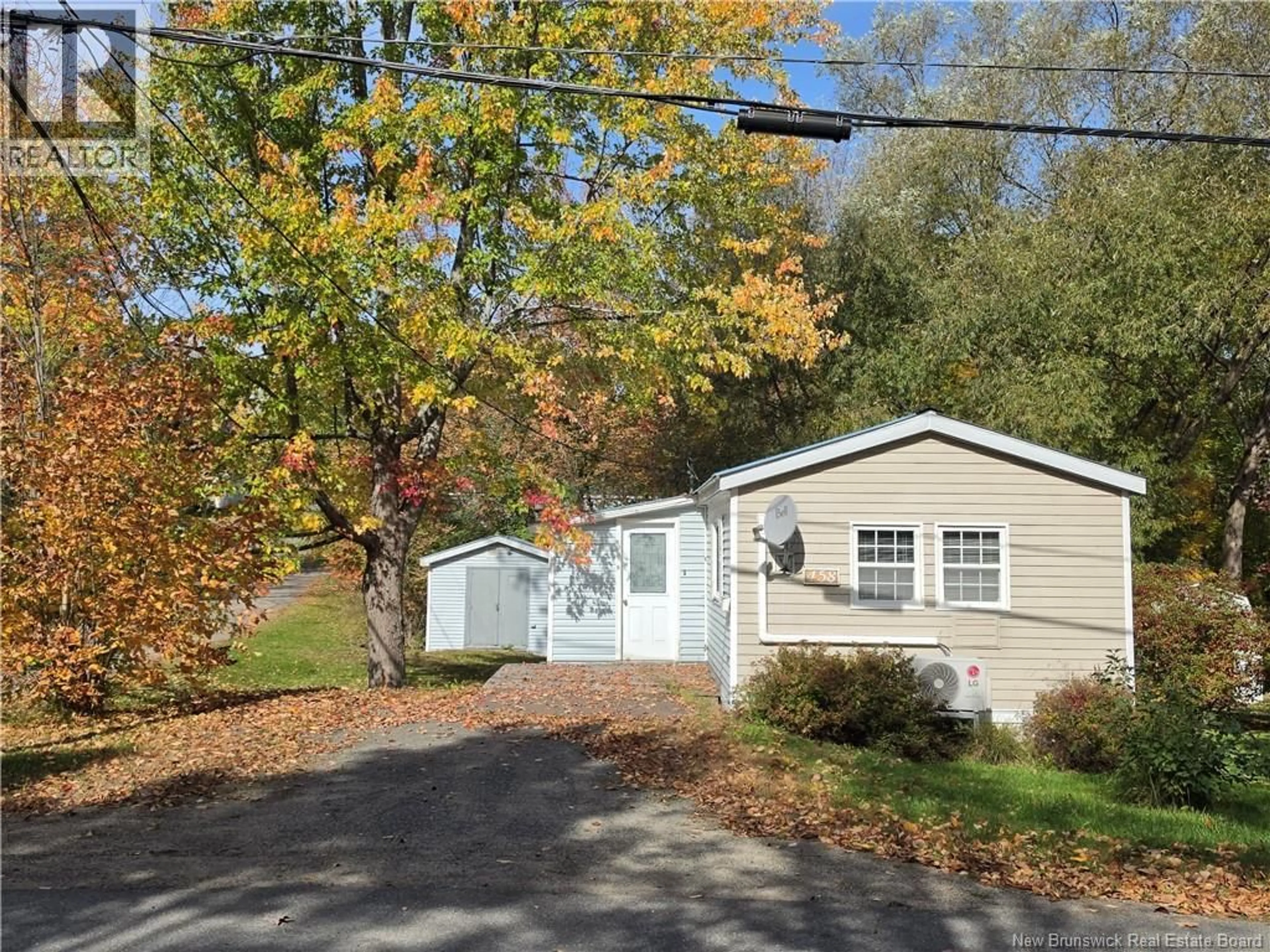 Home with vinyl exterior material, street for 458 ZACHARY LOOP, Fredericton New Brunswick E3B7M3