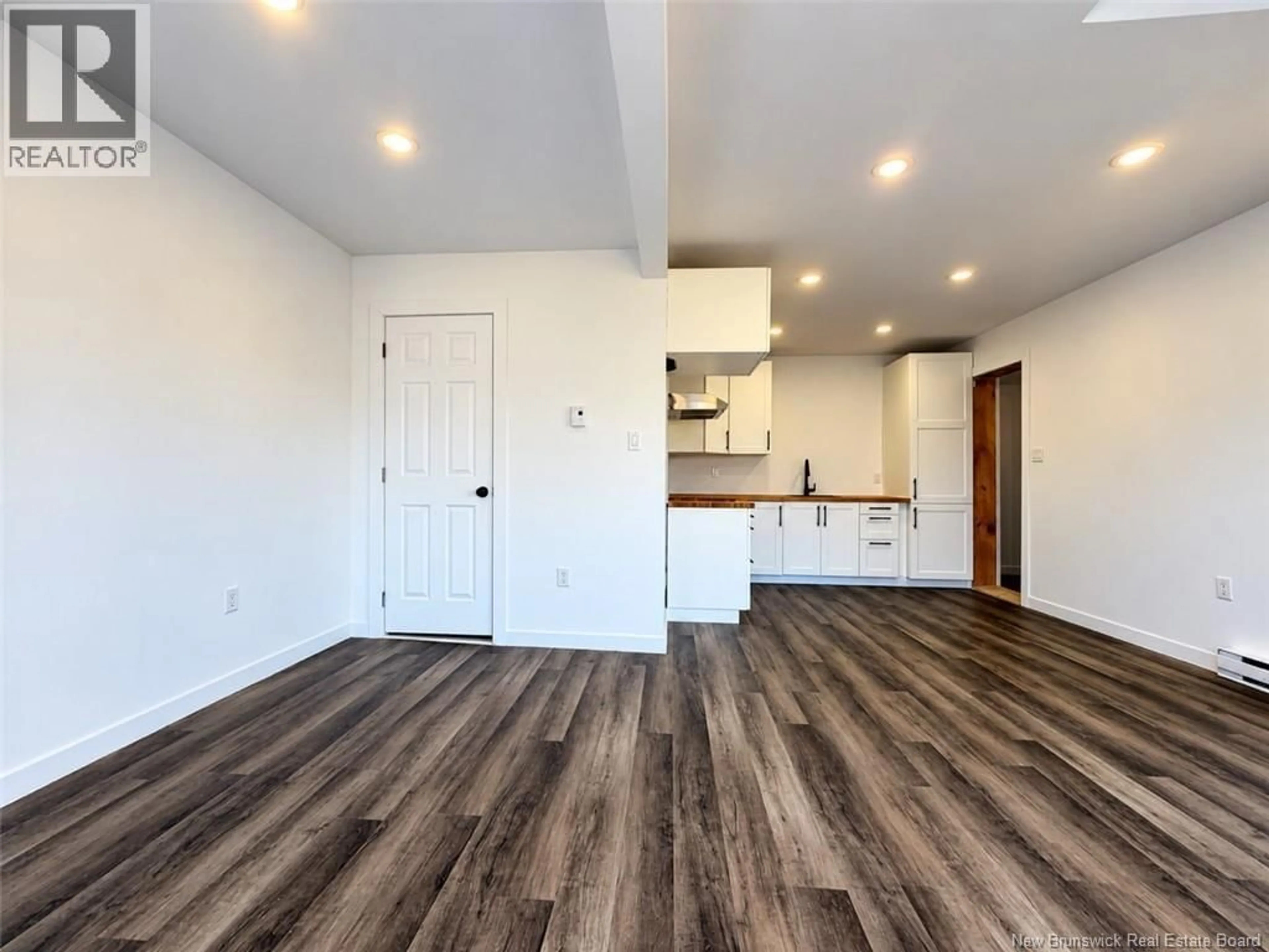 Open concept kitchen, wood/laminate floor for 162 FERGUSON STREET, Atholville New Brunswick E3N4T6
