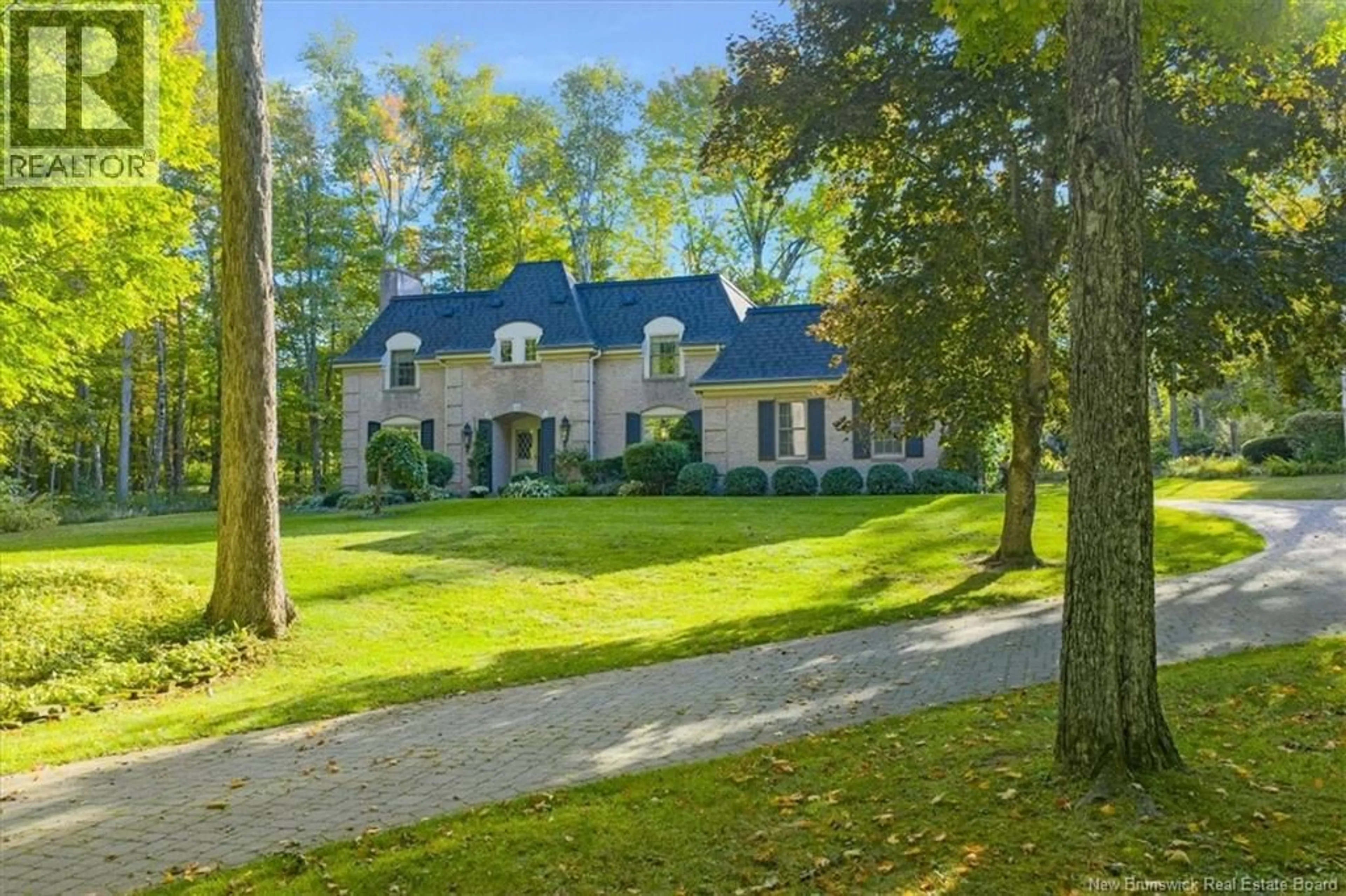 A pic from outside/outdoor area/front of a property/back of a property/a pic from drone, unknown for 65 WILDWOOD LANE, Fredericton New Brunswick E3B5Z2