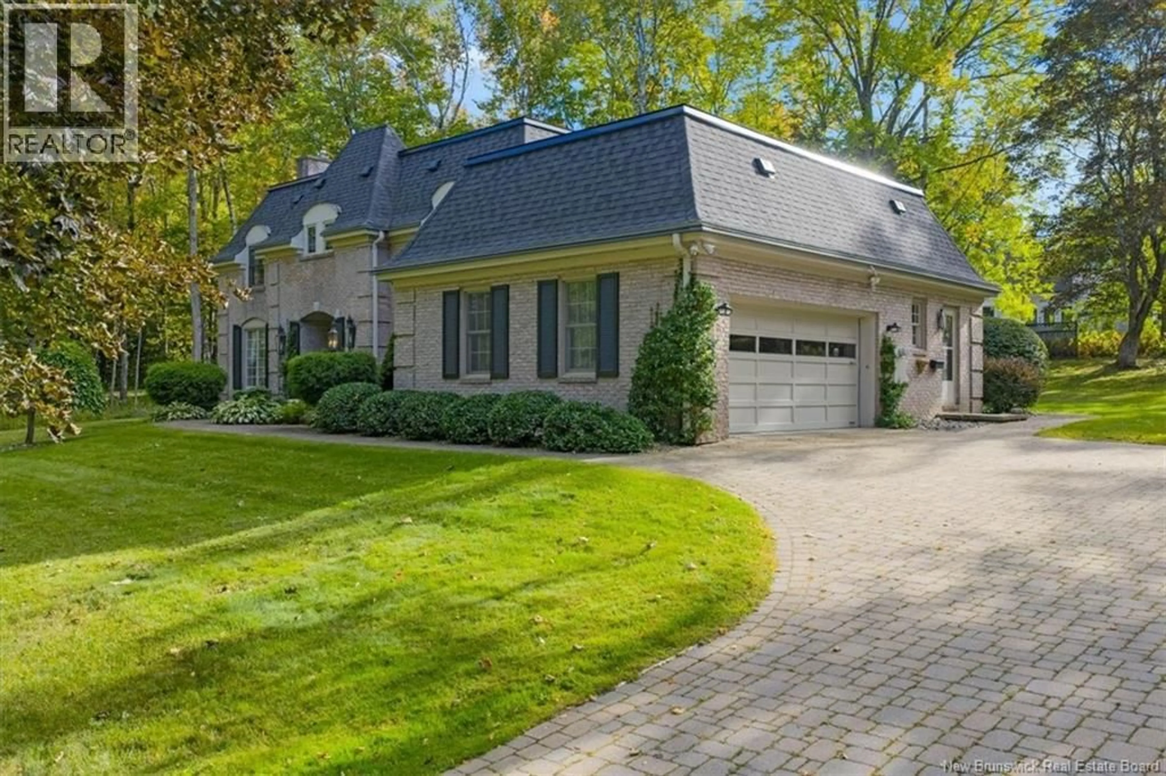 Home with brick exterior material, street for 65 WILDWOOD LANE, Fredericton New Brunswick E3B5Z2