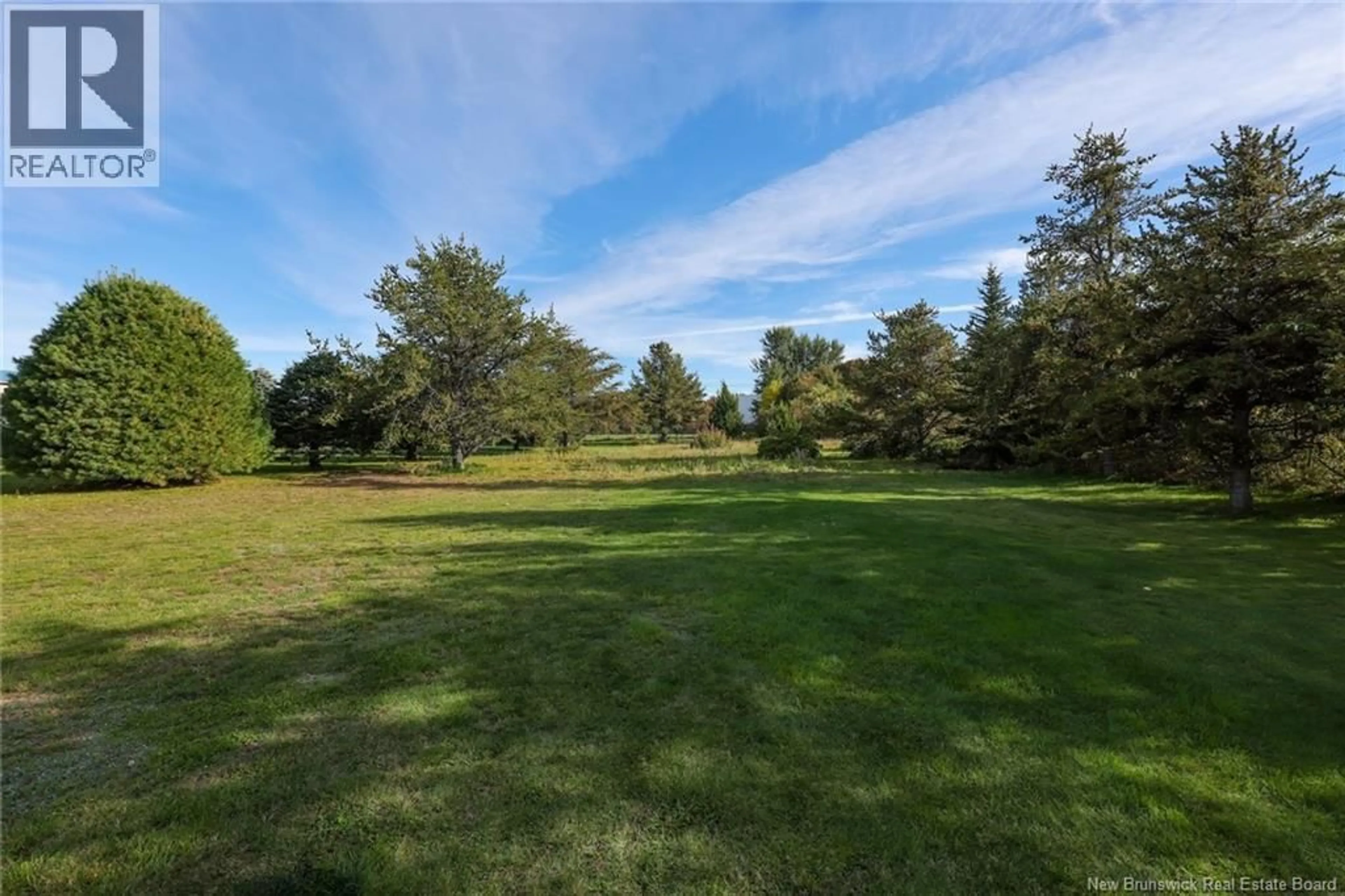 A pic from outside/outdoor area/front of a property/back of a property/a pic from drone, forest/trees view for 683 ROUTE 133, Shediac New Brunswick E4P4Z9
