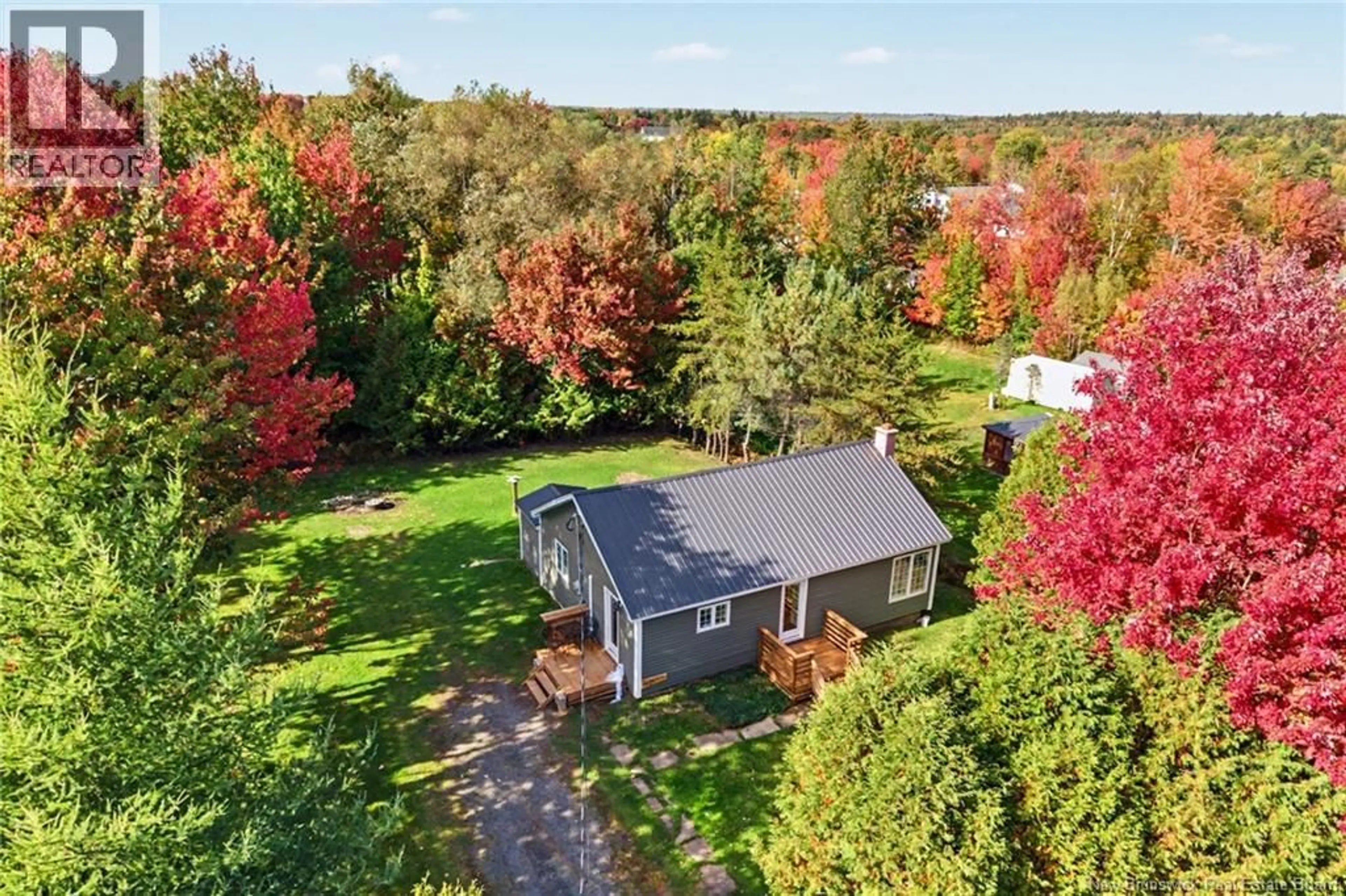 A pic from outside/outdoor area/front of a property/back of a property/a pic from drone, unknown for 26 CHESTNUT STREET, Minto New Brunswick E4B3L5