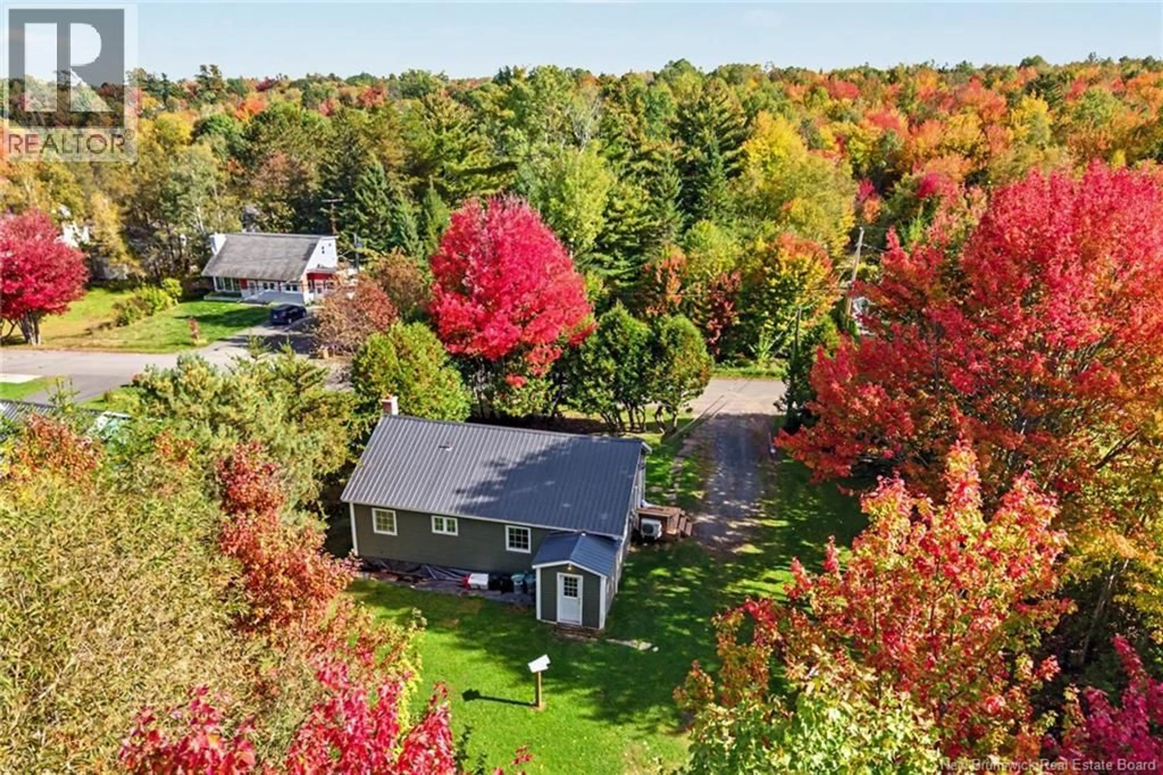 A pic from outside/outdoor area/front of a property/back of a property/a pic from drone, unknown for 26 CHESTNUT STREET, Minto New Brunswick E4B3L5