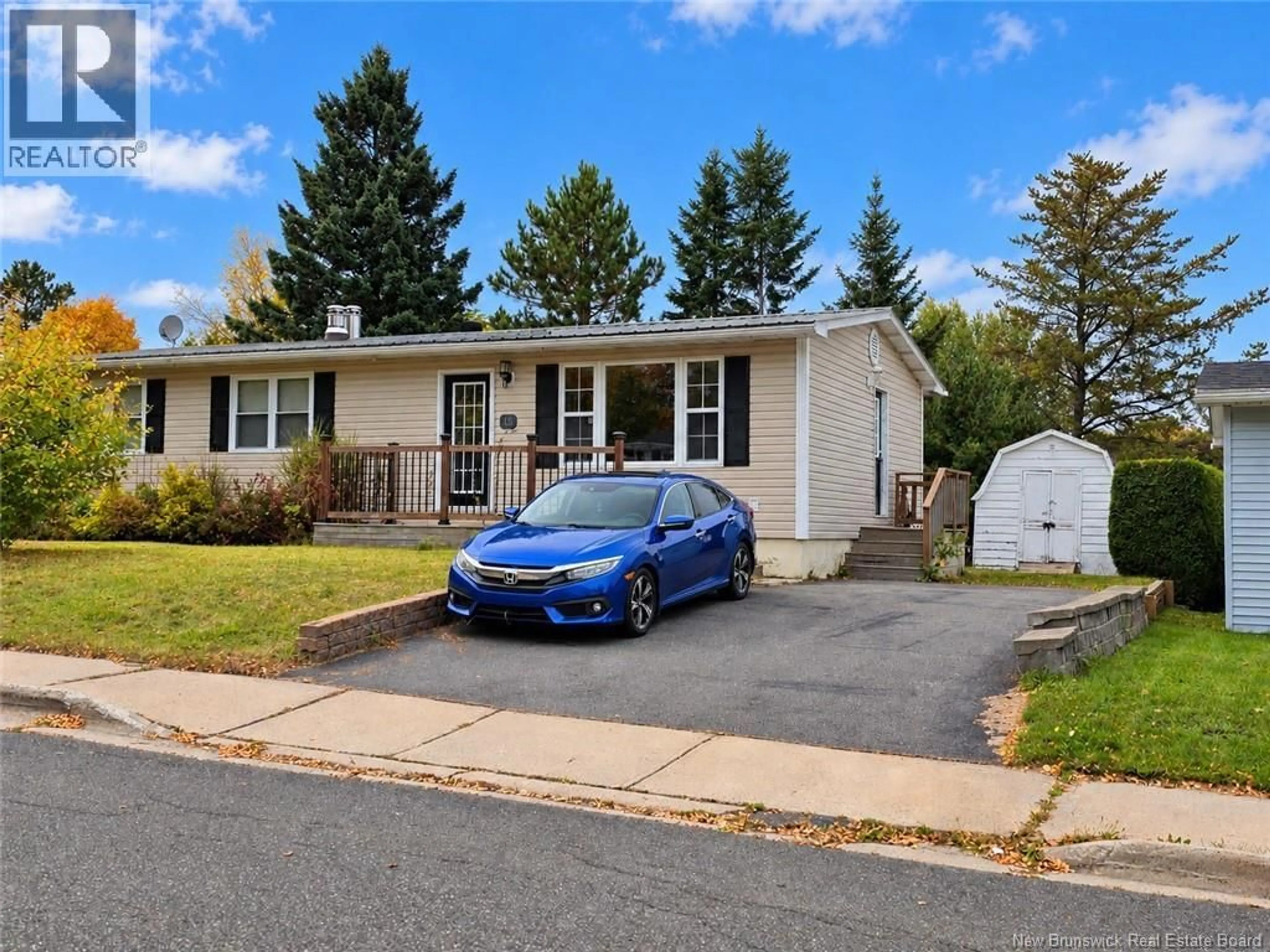 Home with vinyl exterior material, street for 15 BIRD STREET, Nackawic New Brunswick E6G1B9