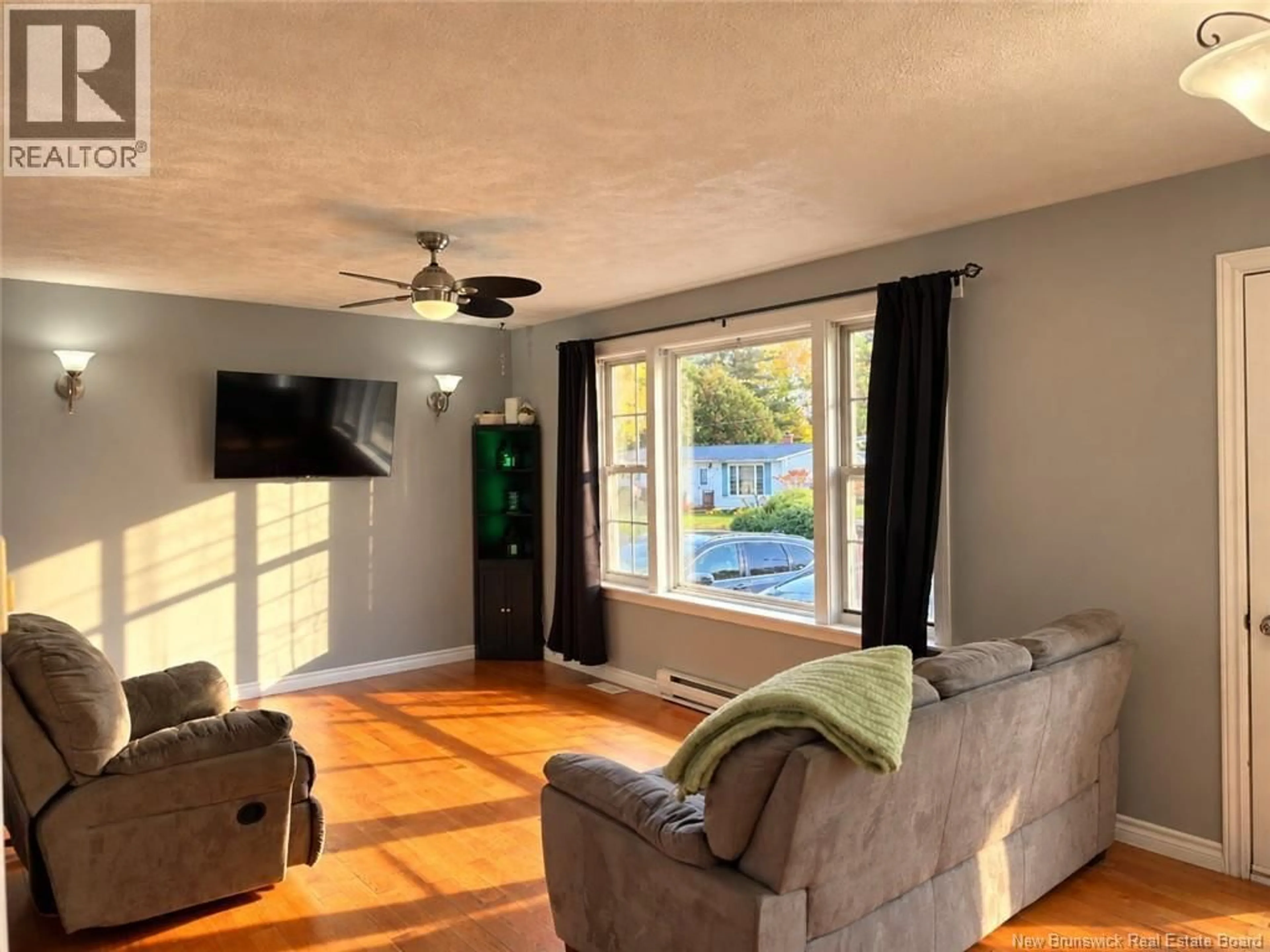 Living room with furniture, wood/laminate floor for 15 BIRD STREET, Nackawic New Brunswick E6G1B9