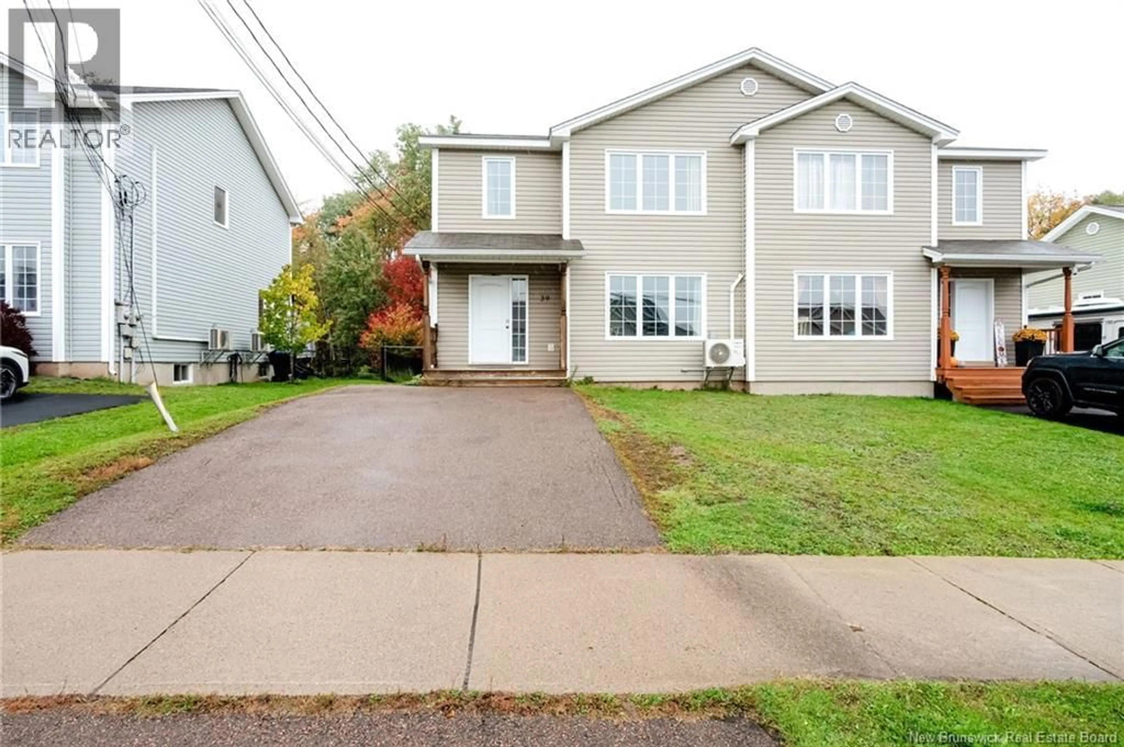 Home with vinyl exterior material, street for 39 SENESE STREET, Moncton New Brunswick E1E0B7