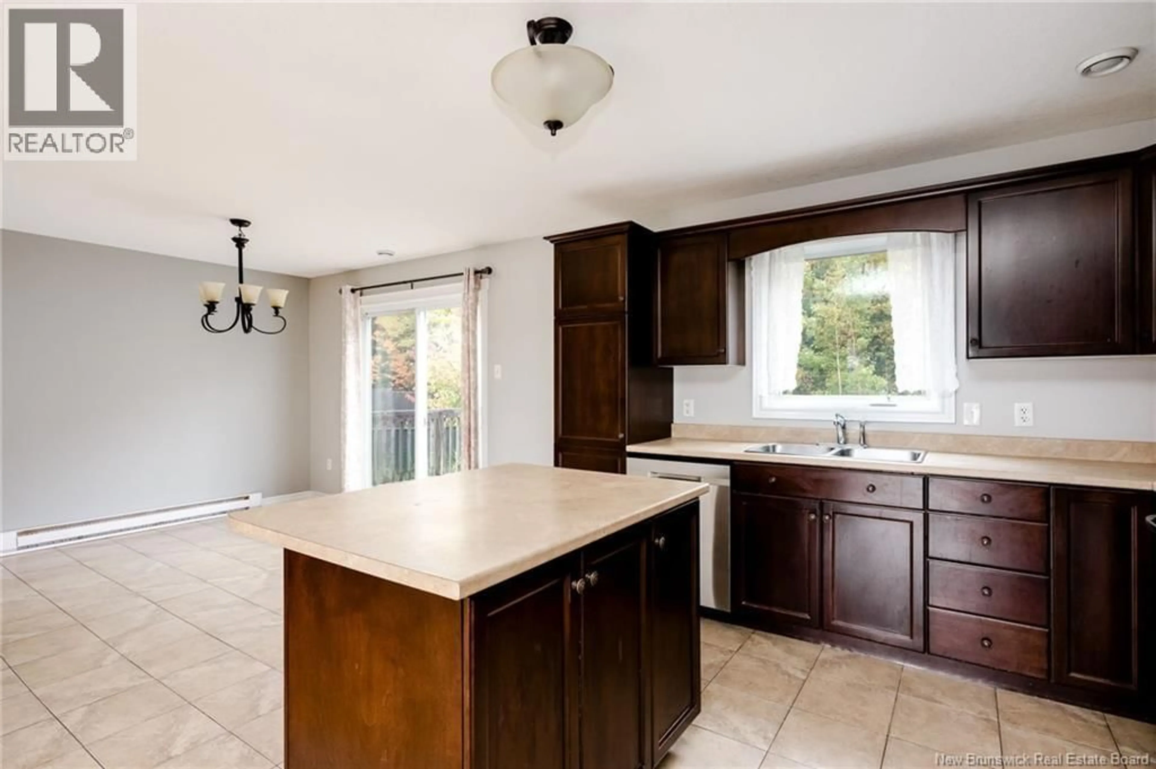 Open concept kitchen, ceramic/tile floor for 39 SENESE STREET, Moncton New Brunswick E1E0B7