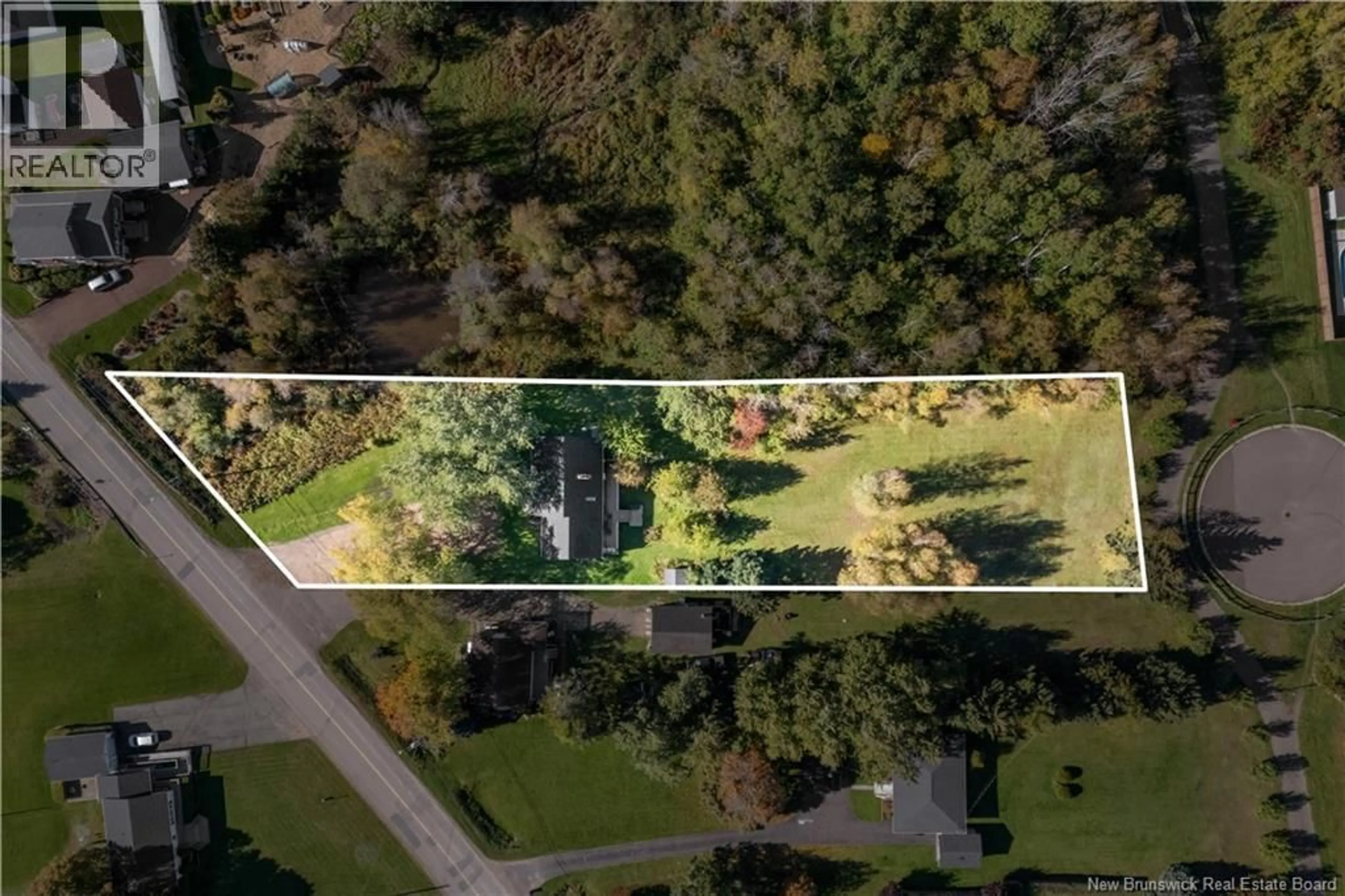 A pic from outside/outdoor area/front of a property/back of a property/a pic from drone, forest/trees view for 464 GREENWOOD, Shediac New Brunswick E4P1V6