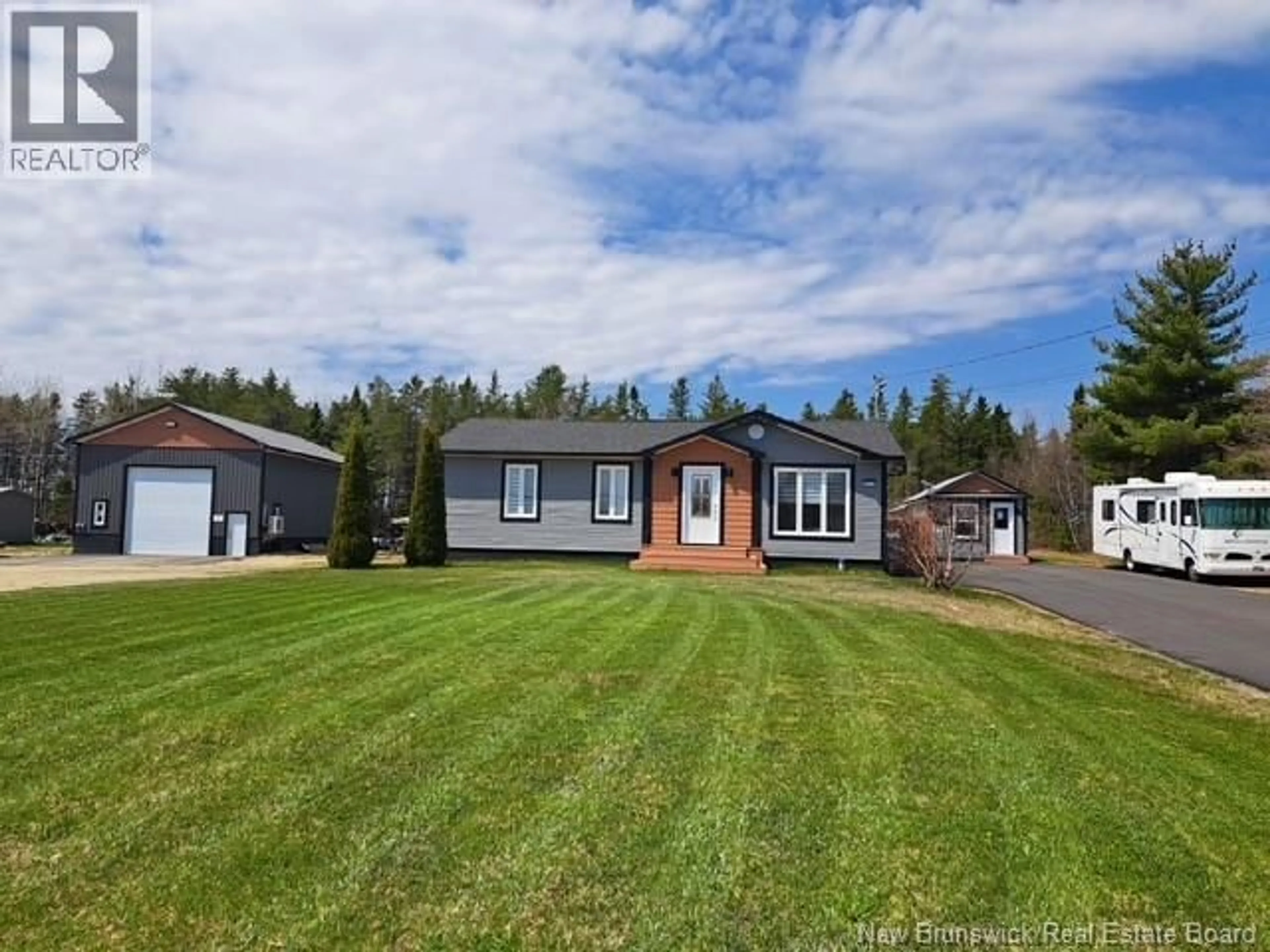 A pic from outside/outdoor area/front of a property/back of a property/a pic from drone, unknown for 4915 ROUTE 11, Brantville New Brunswick E9H1M3