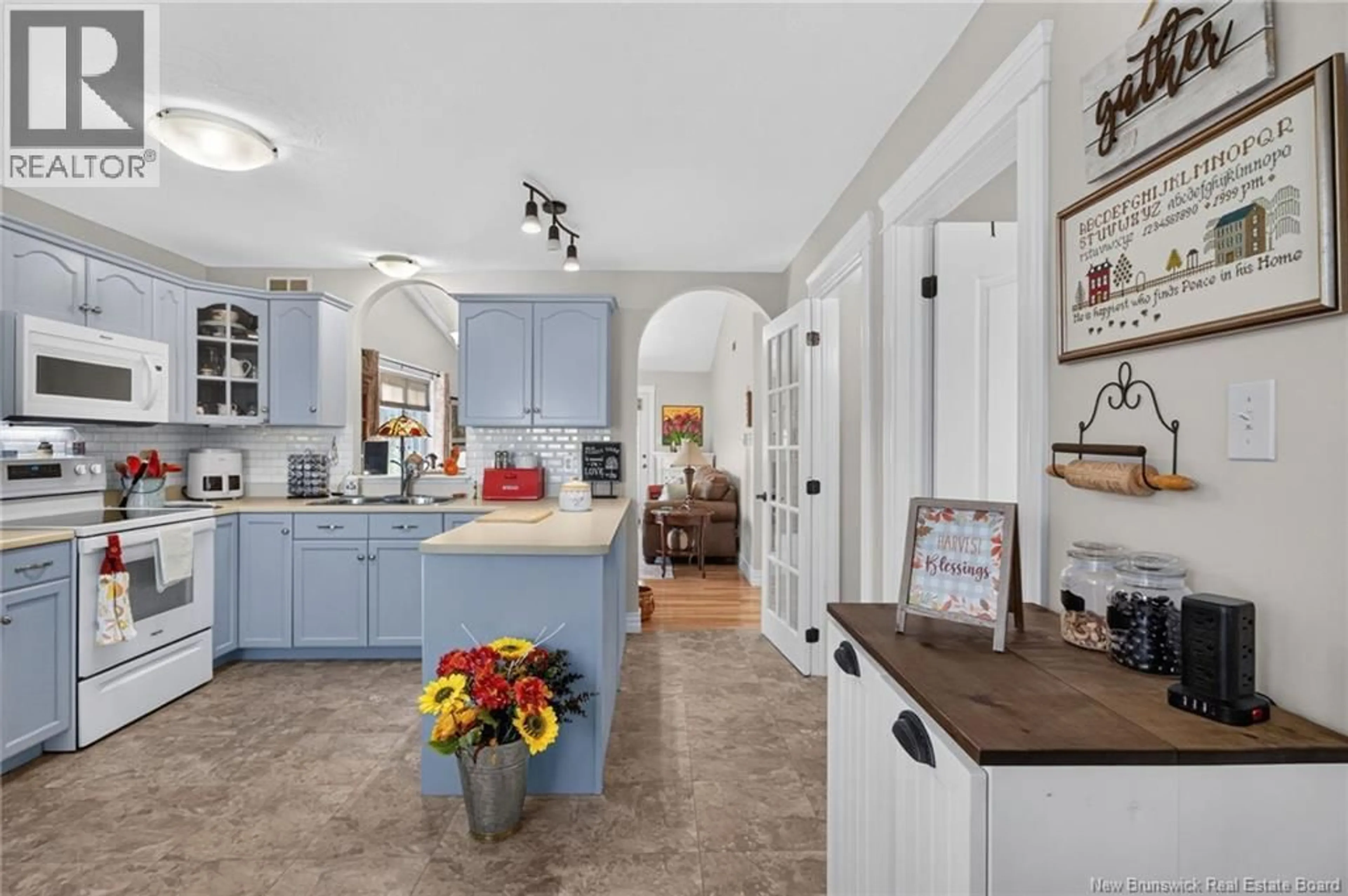 Open concept kitchen, ceramic/tile floor for 155 KETTLE CREEK COURT, Riverview New Brunswick E1B0A8