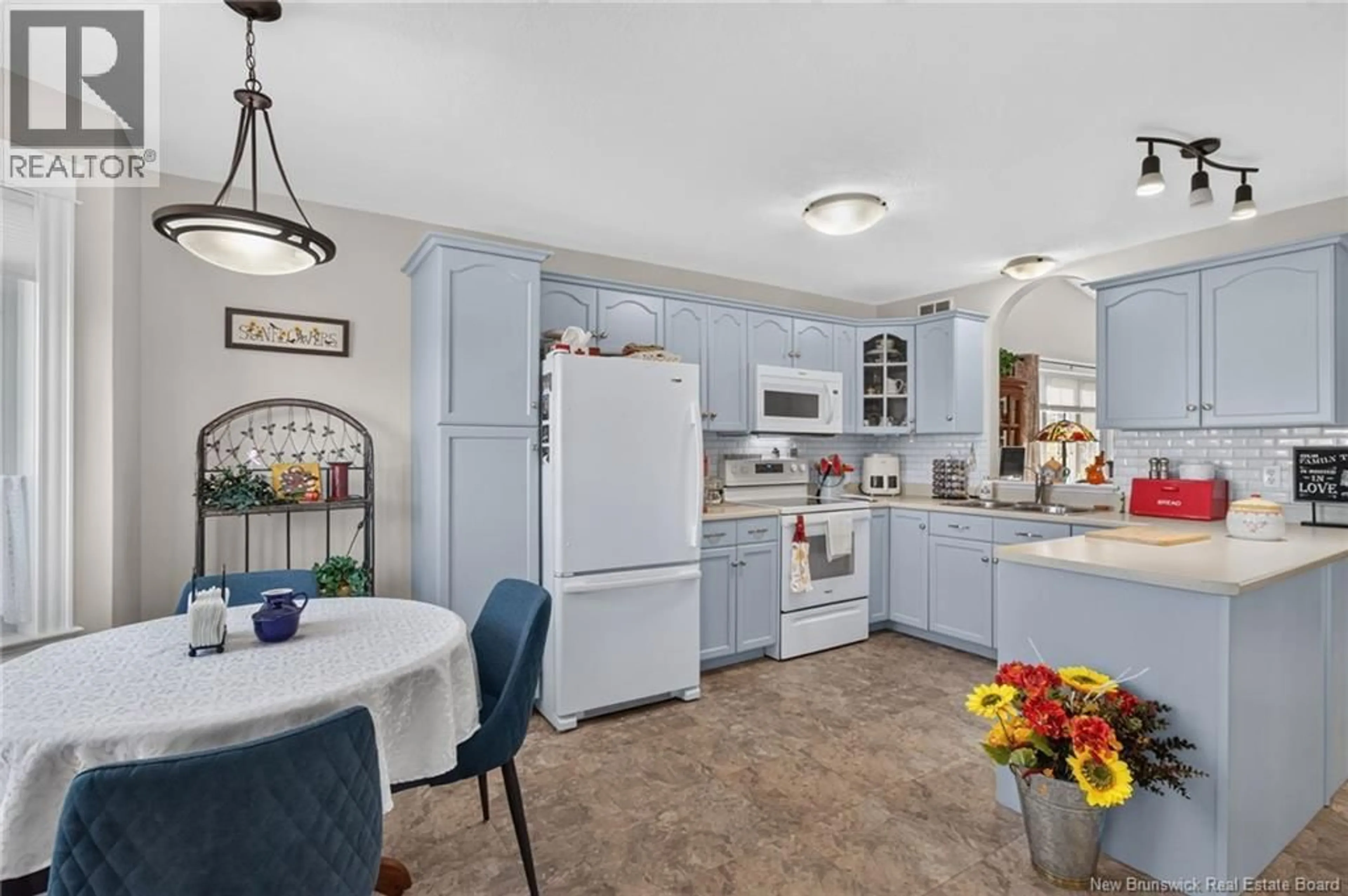 Open concept kitchen, ceramic/tile floor for 155 KETTLE CREEK COURT, Riverview New Brunswick E1B0A8