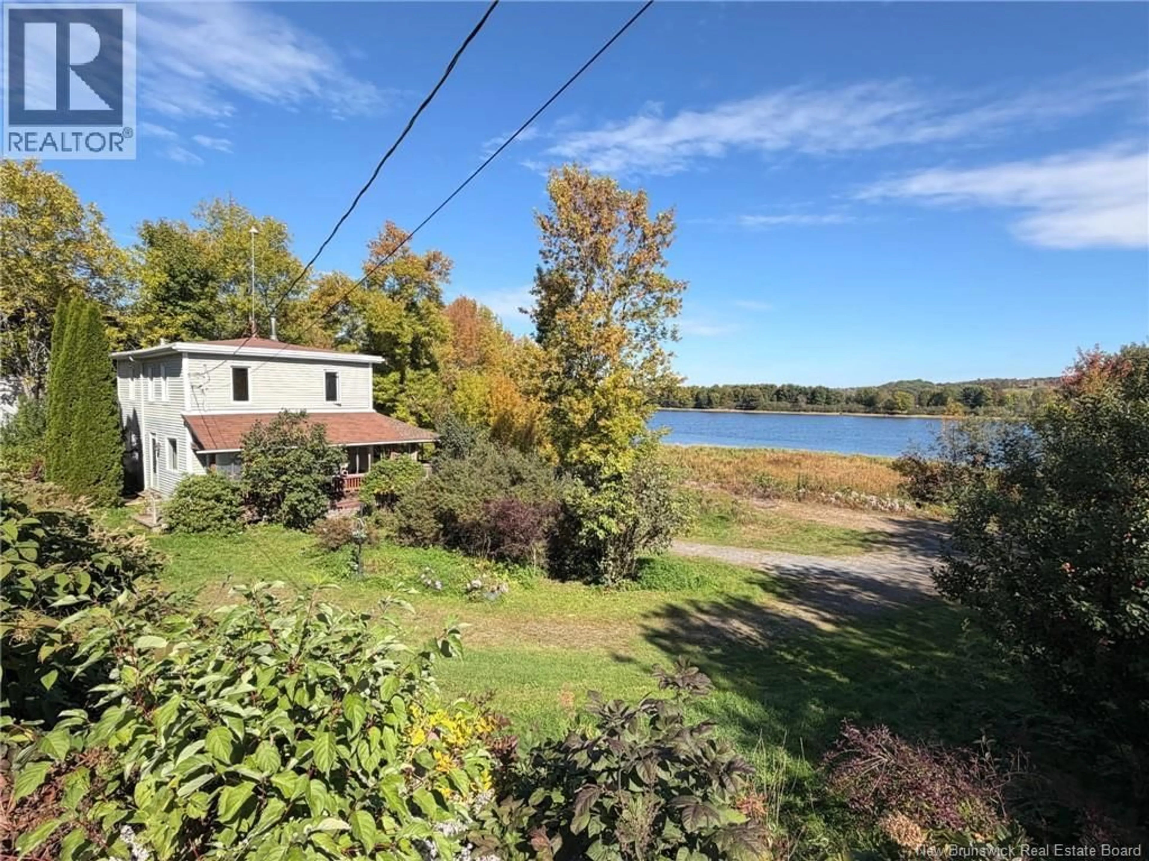 A pic from outside/outdoor area/front of a property/back of a property/a pic from drone, water/lake/river/ocean view for 5231 ROUTE 102, Hampstead New Brunswick E5M2B5