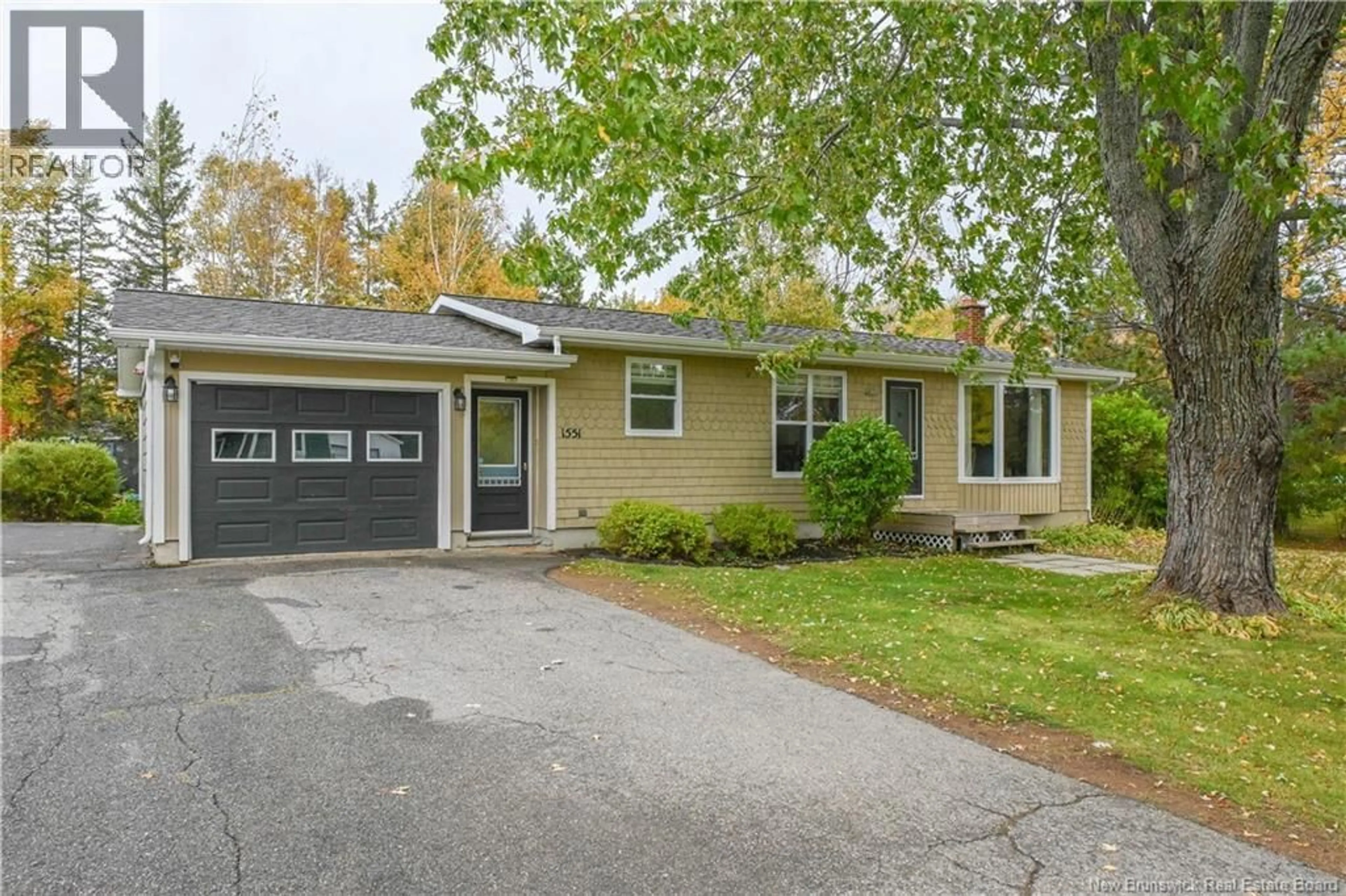 Home with vinyl exterior material, street for 1551 BOISJOLI STREET, Paquetville New Brunswick E8R1B9