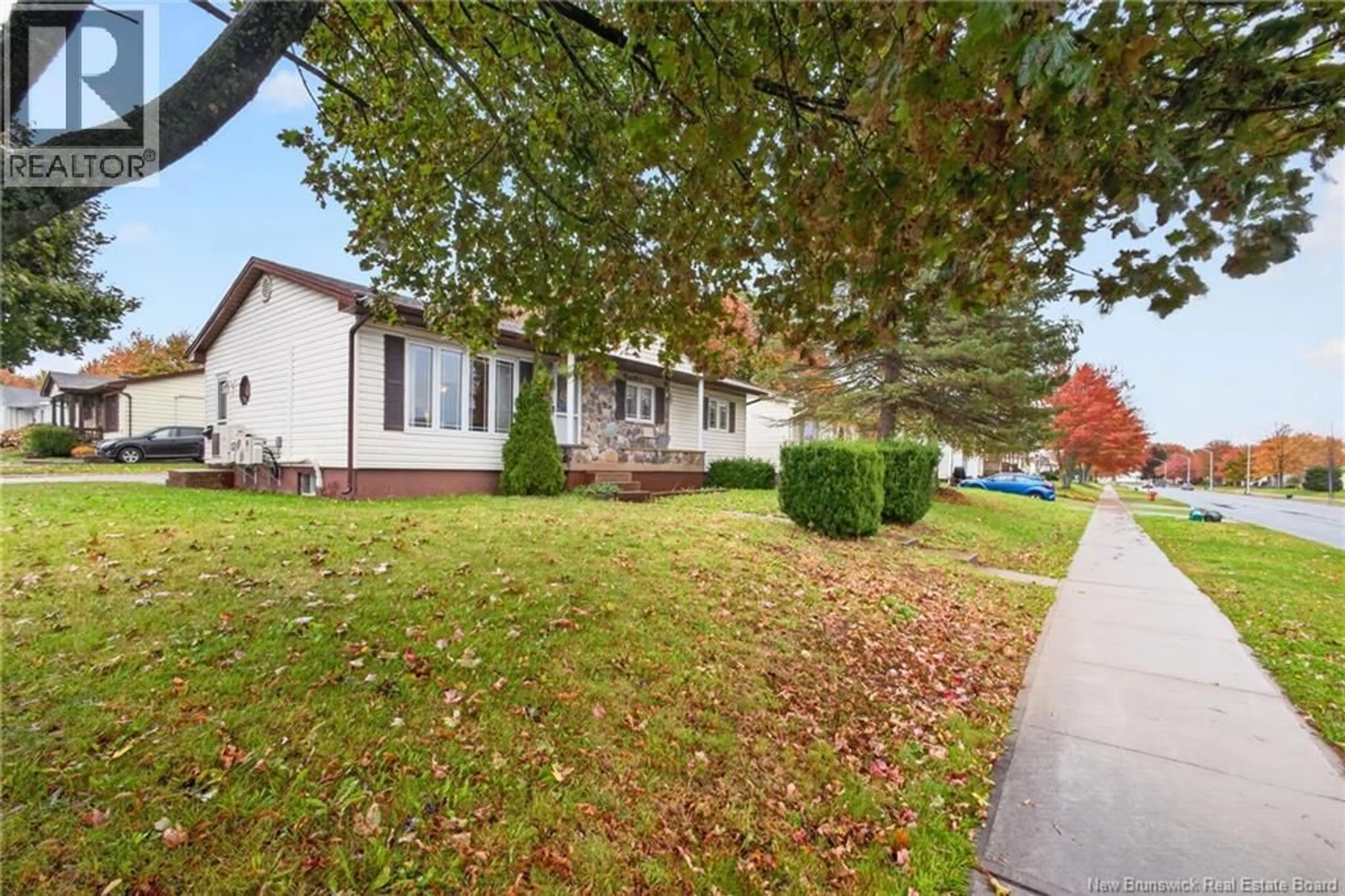 Home with vinyl exterior material, street for 135 HENNESSEY ROAD, Moncton New Brunswick E1A4Y8