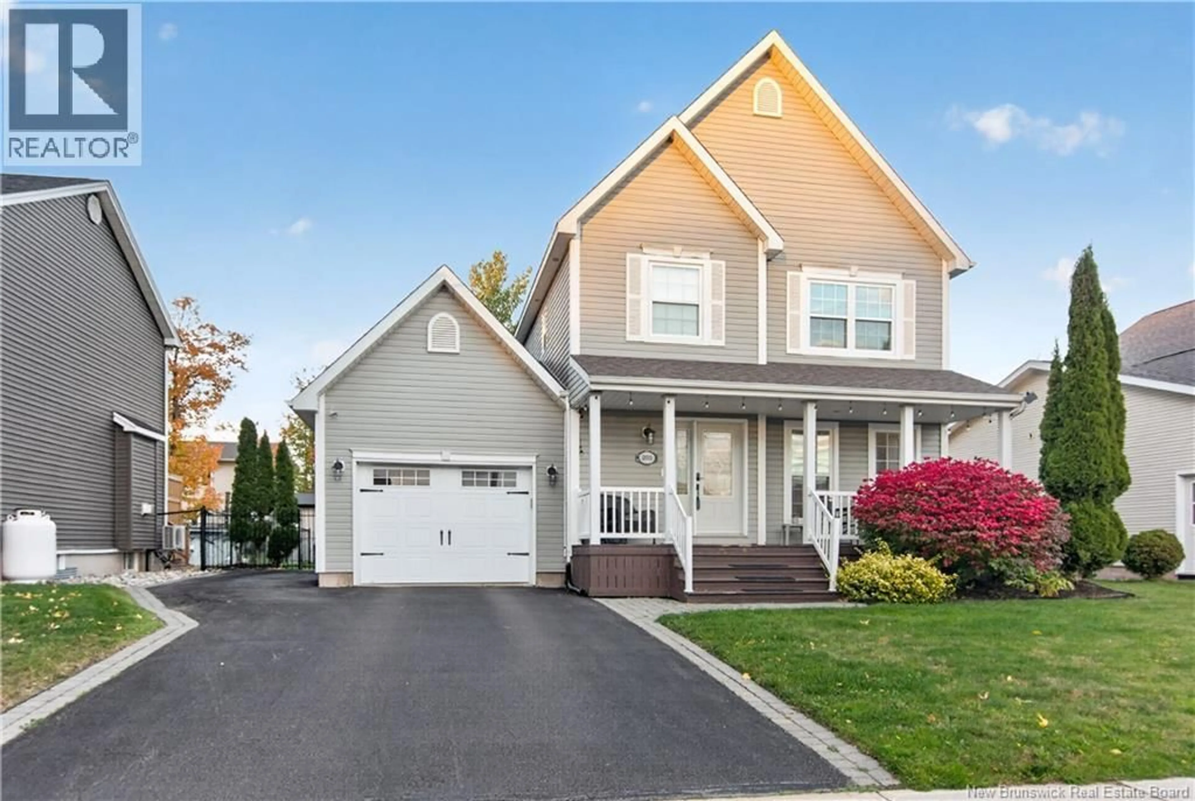 Home with vinyl exterior material, street for 203 TWIN OAKS DRIVE, Moncton New Brunswick E1G4W4