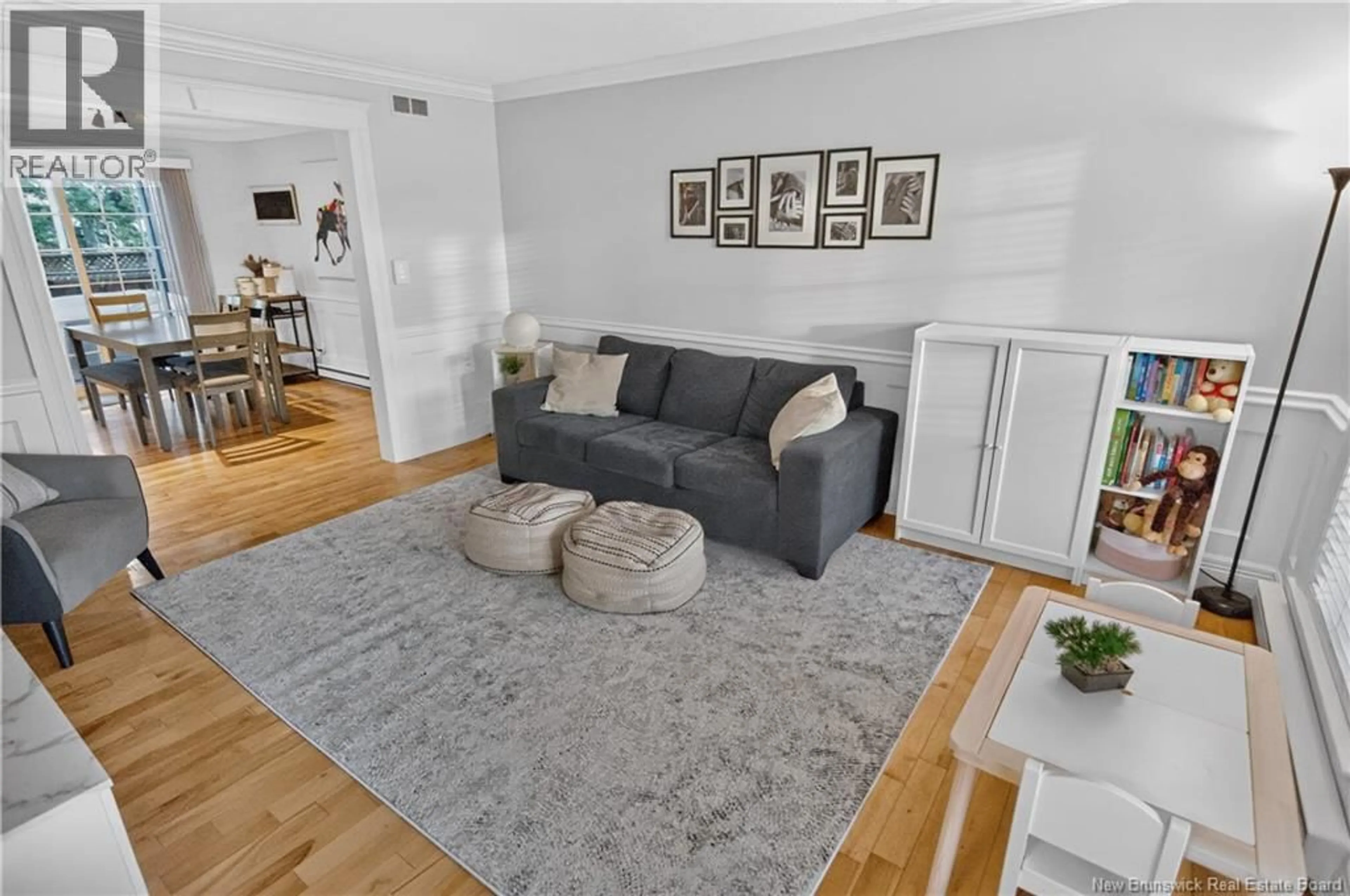 Living room with furniture, unknown for 203 TWIN OAKS DRIVE, Moncton New Brunswick E1G4W4