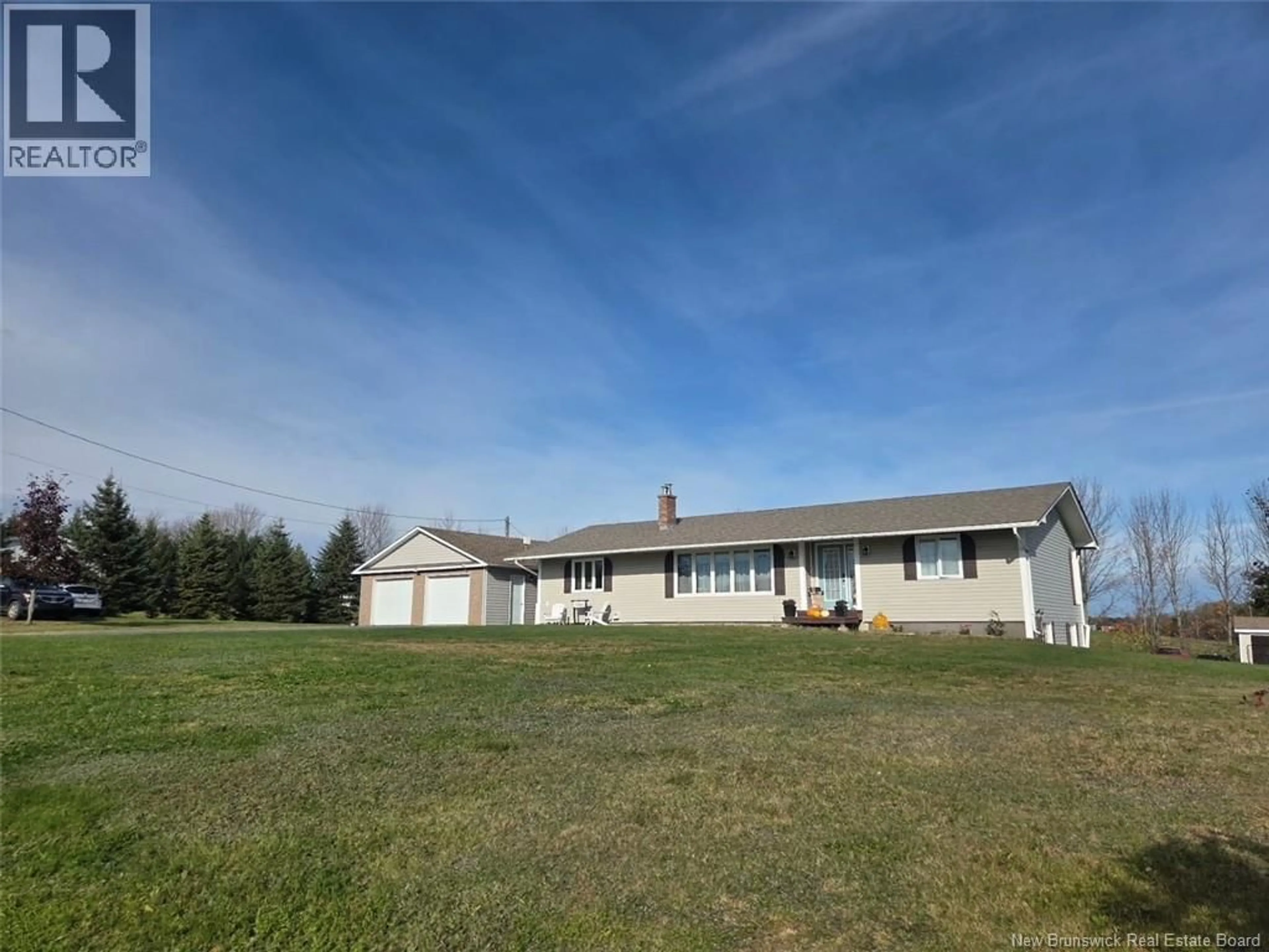 A pic from outside/outdoor area/front of a property/back of a property/a pic from drone, unknown for 18 HILLSIDE STREET, Hartford New Brunswick E7M5R3