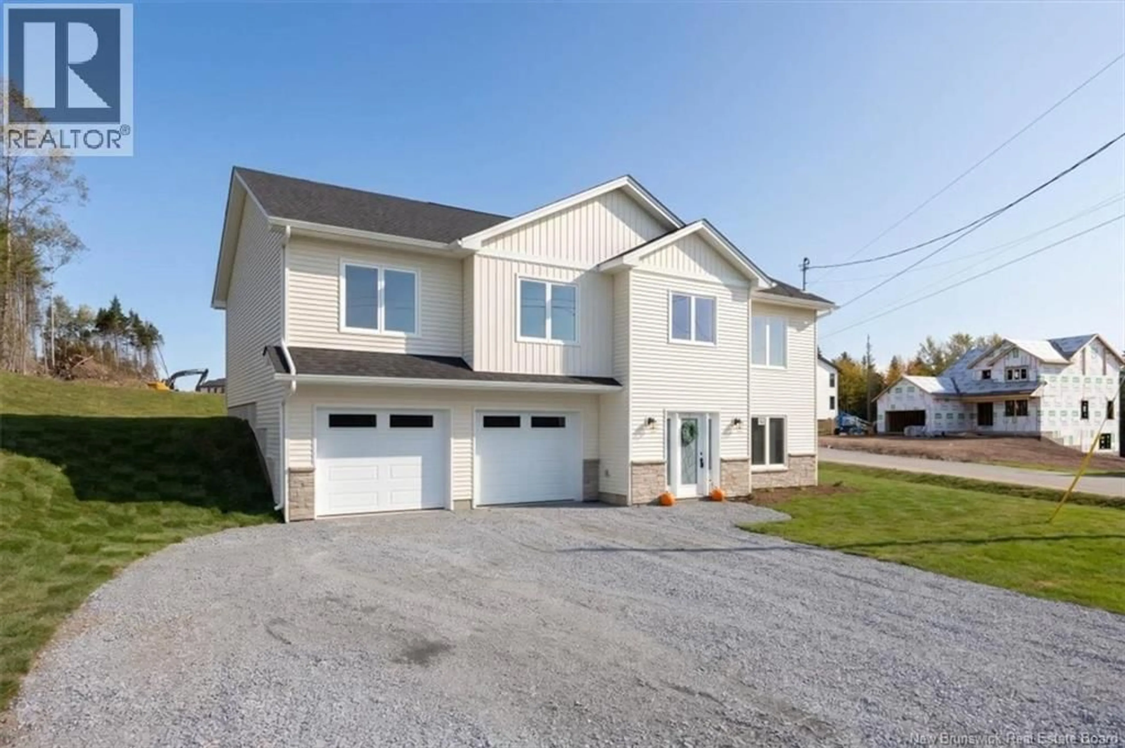 Home with vinyl exterior material, street for 141 MONTANA DRIVE, Quispamsis New Brunswick E2E0W1