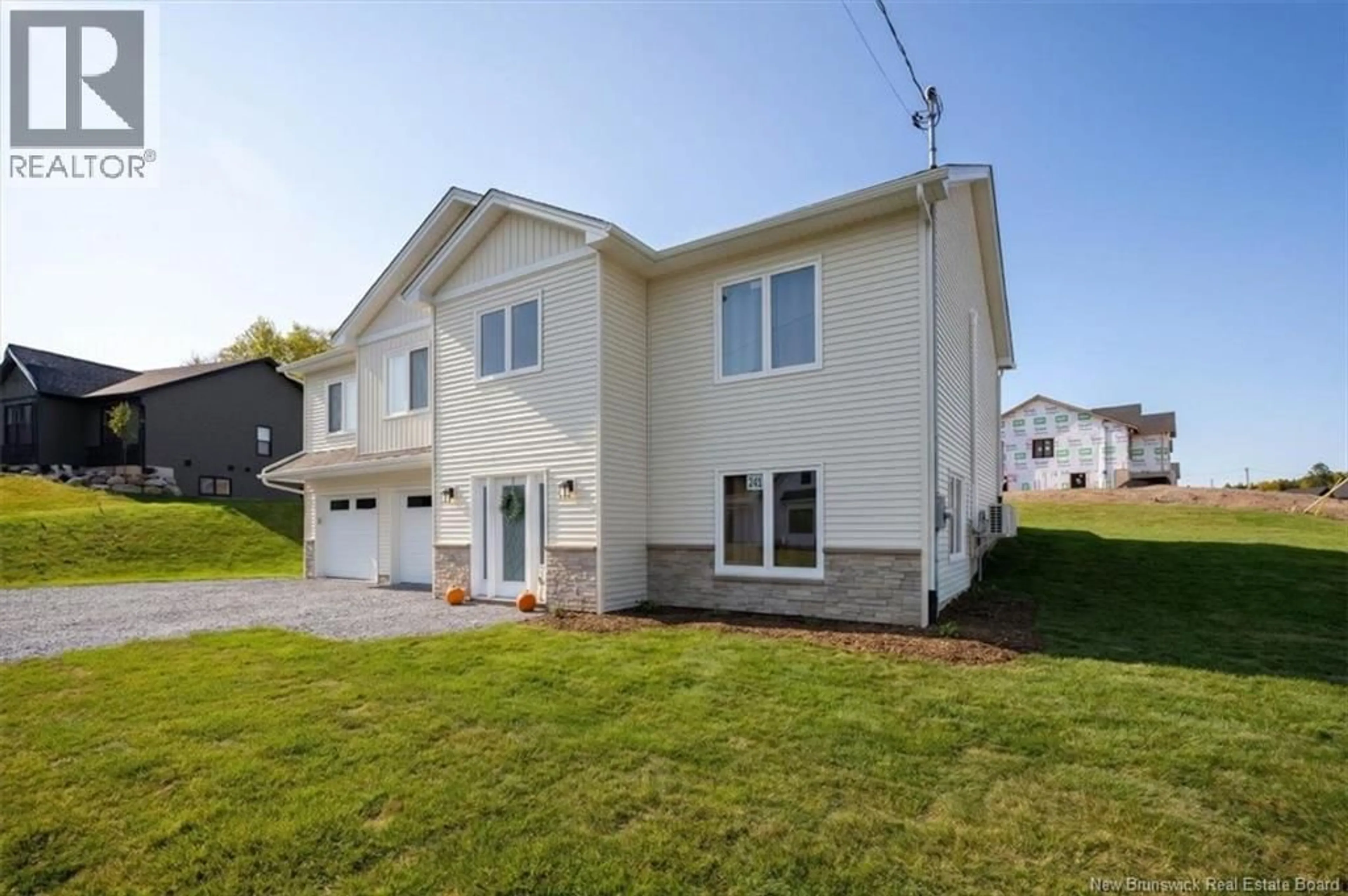 Home with vinyl exterior material, street for 141 MONTANA DRIVE, Quispamsis New Brunswick E2E0W1