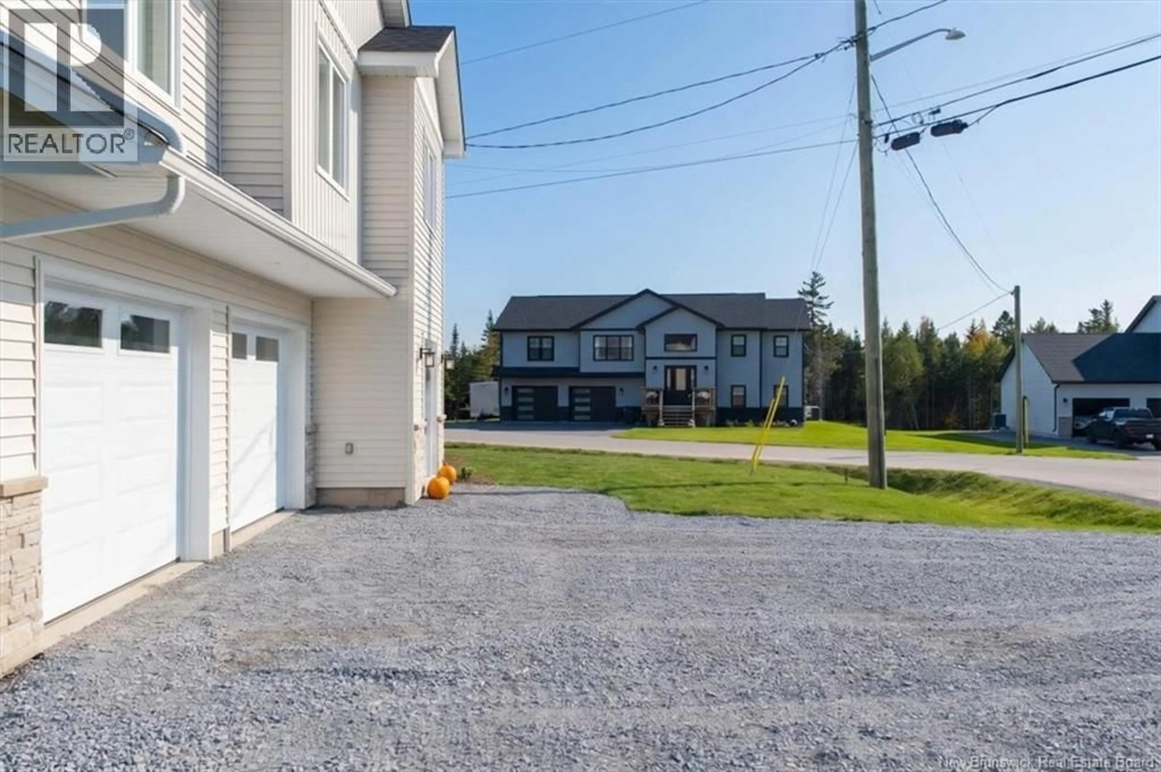 A pic from outside/outdoor area/front of a property/back of a property/a pic from drone, street for 141 MONTANA DRIVE, Quispamsis New Brunswick E2E0W1
