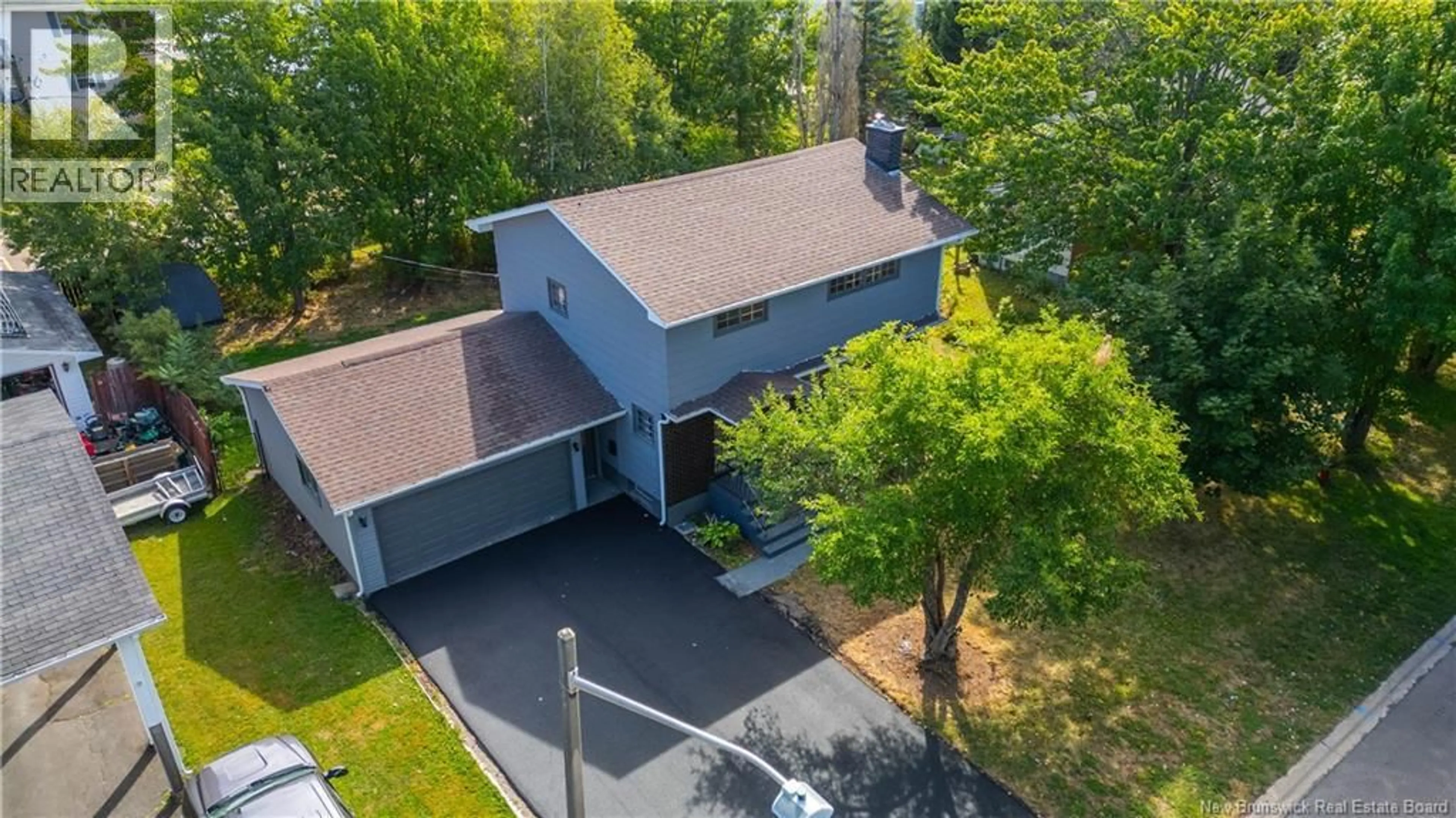 A pic from outside/outdoor area/front of a property/back of a property/a pic from drone, street for 38 WILSON ROAD, Riverview New Brunswick E1B2W1