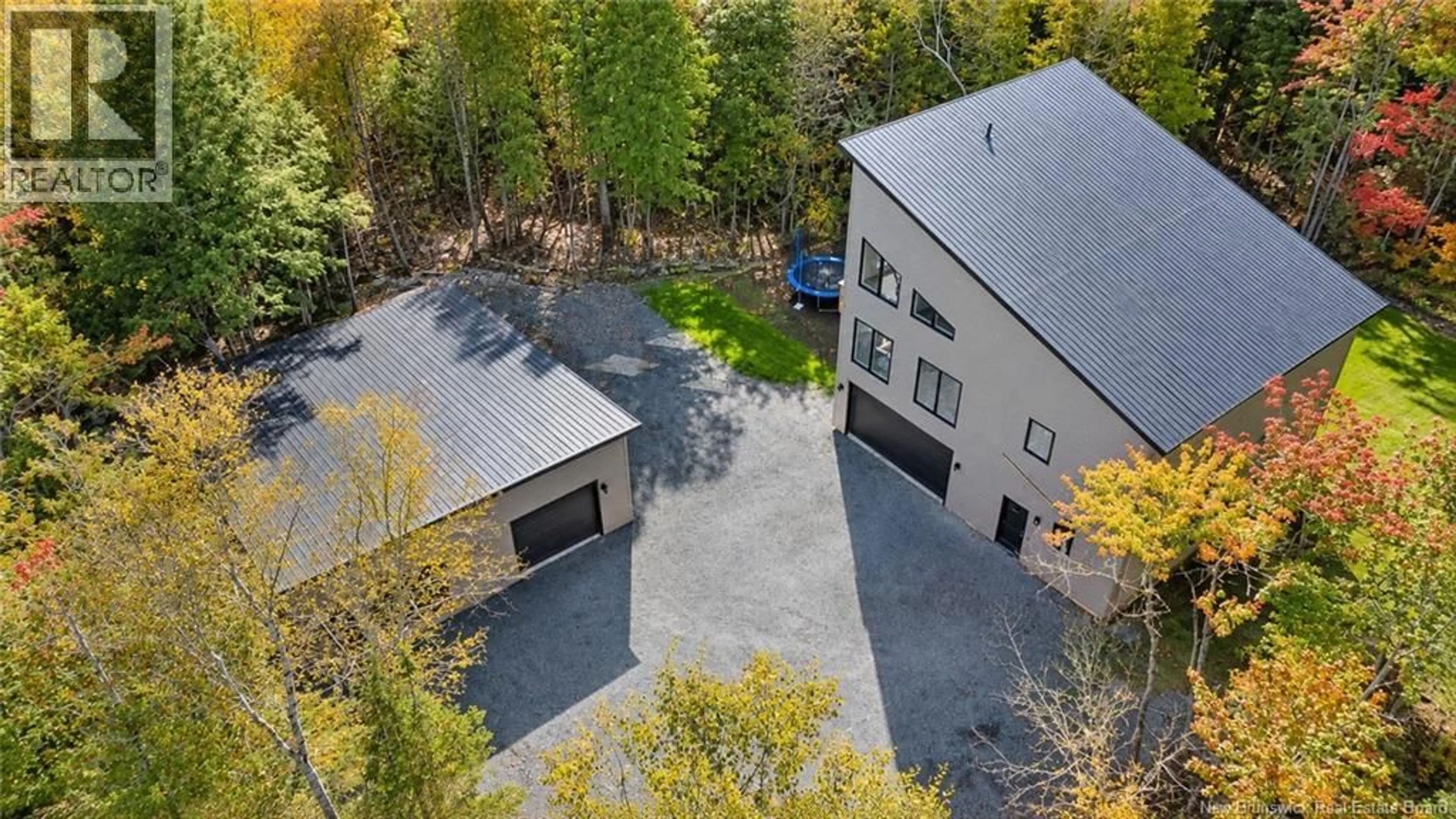 A pic from outside/outdoor area/front of a property/back of a property/a pic from drone, unknown for 34 CLEARBROOK DRIVE, Charters Settlement New Brunswick E3C1X9
