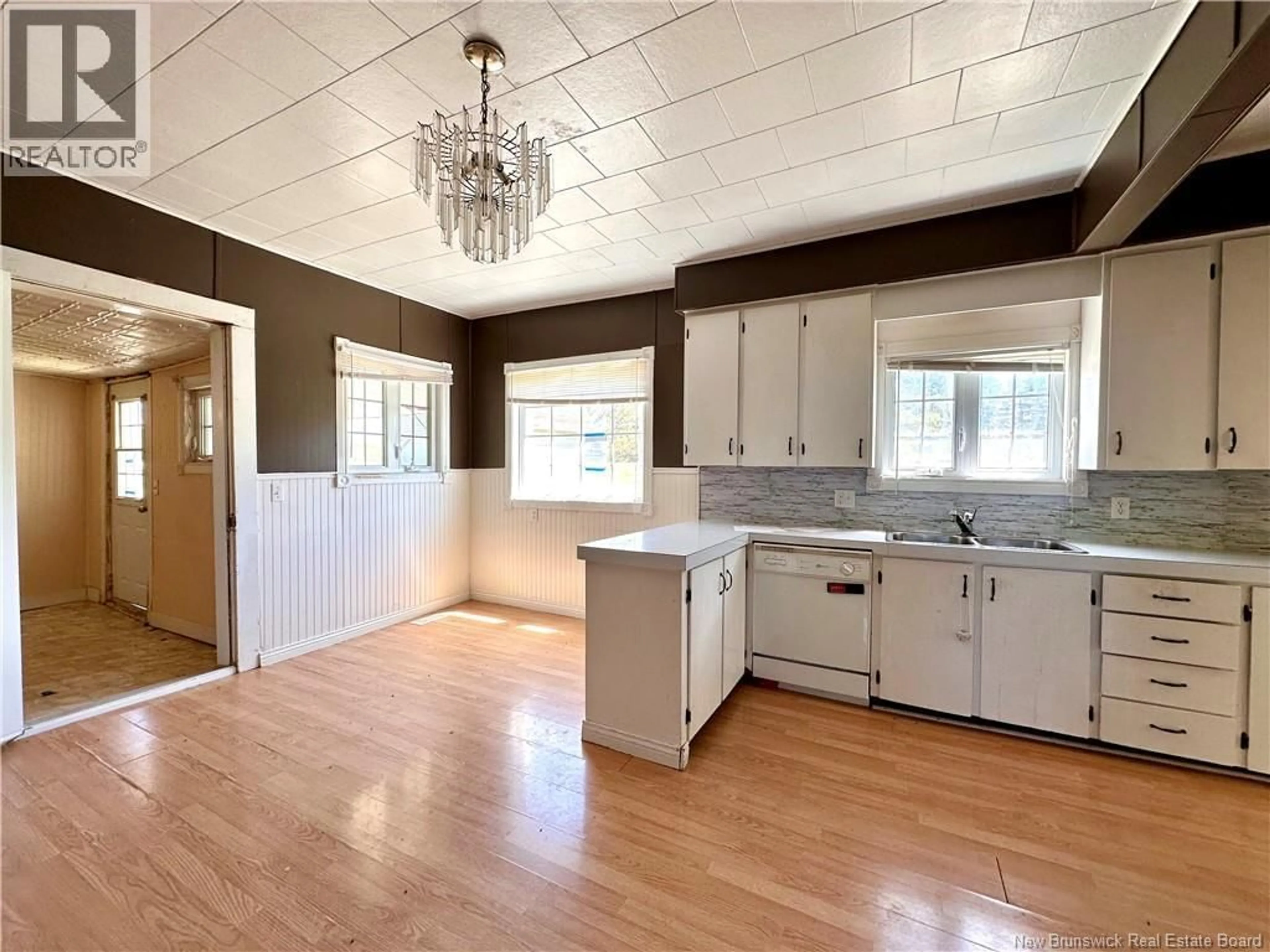 Open concept kitchen, wood/laminate floor for 233 HILLDALE ROAD, New Denmark New Brunswick E7G1V7