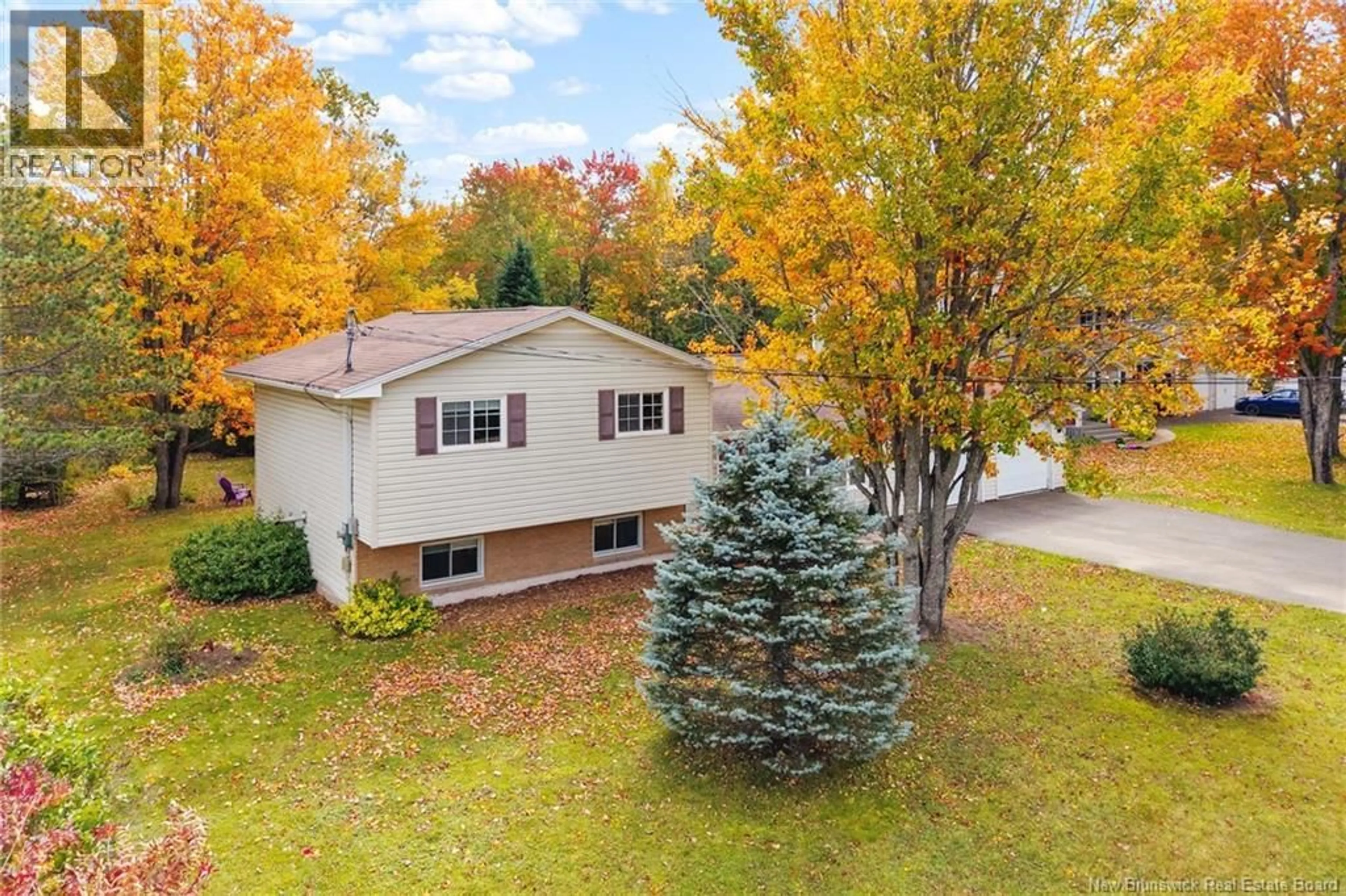 A pic from outside/outdoor area/front of a property/back of a property/a pic from drone, street for 5 DEER LANE, New Maryland New Brunswick E3C1H8