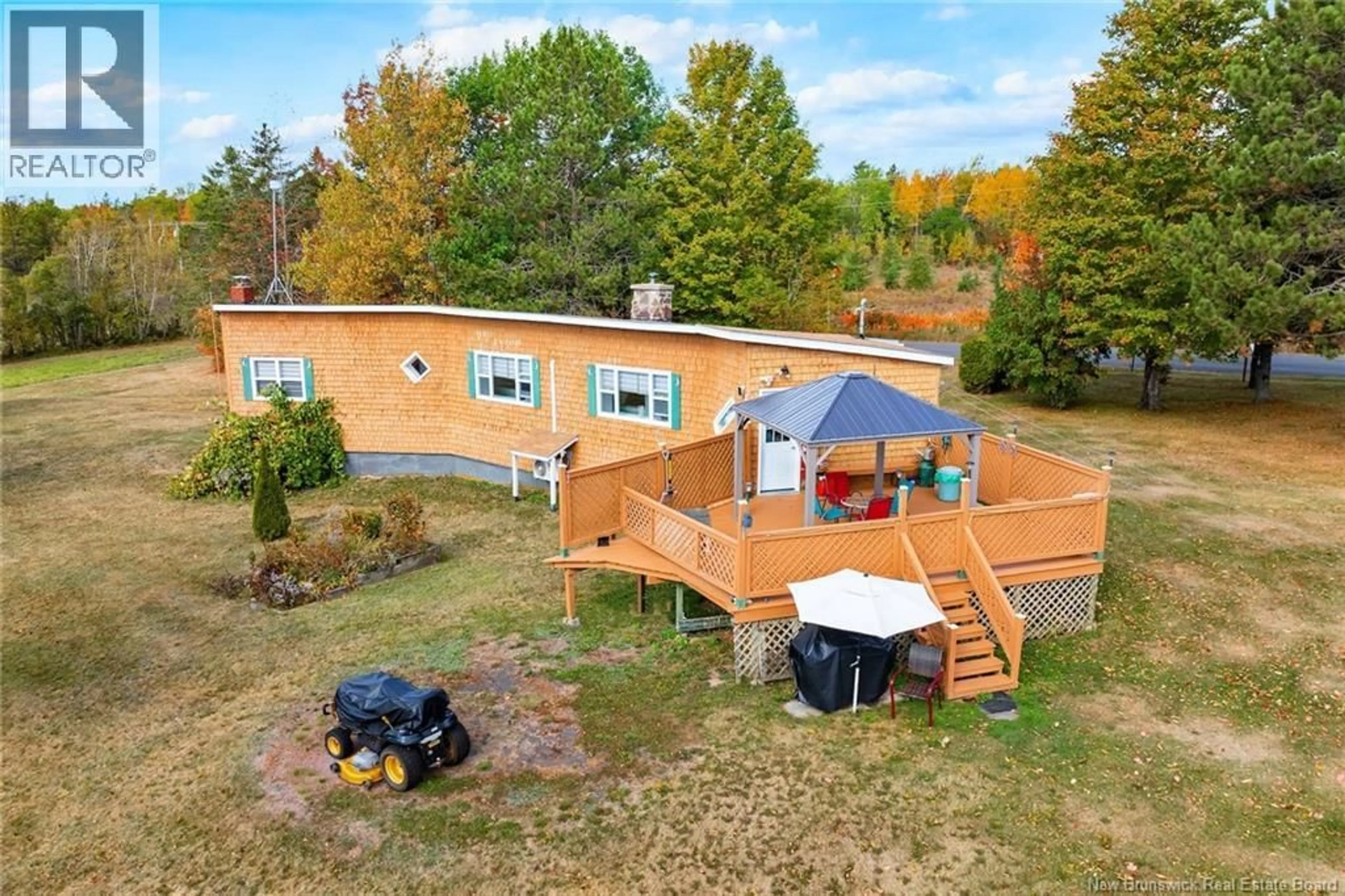 A pic from outside/outdoor area/front of a property/back of a property/a pic from drone, unknown for 1520 COX POINT ROAD, Cumberland Bay New Brunswick E4A2Z7
