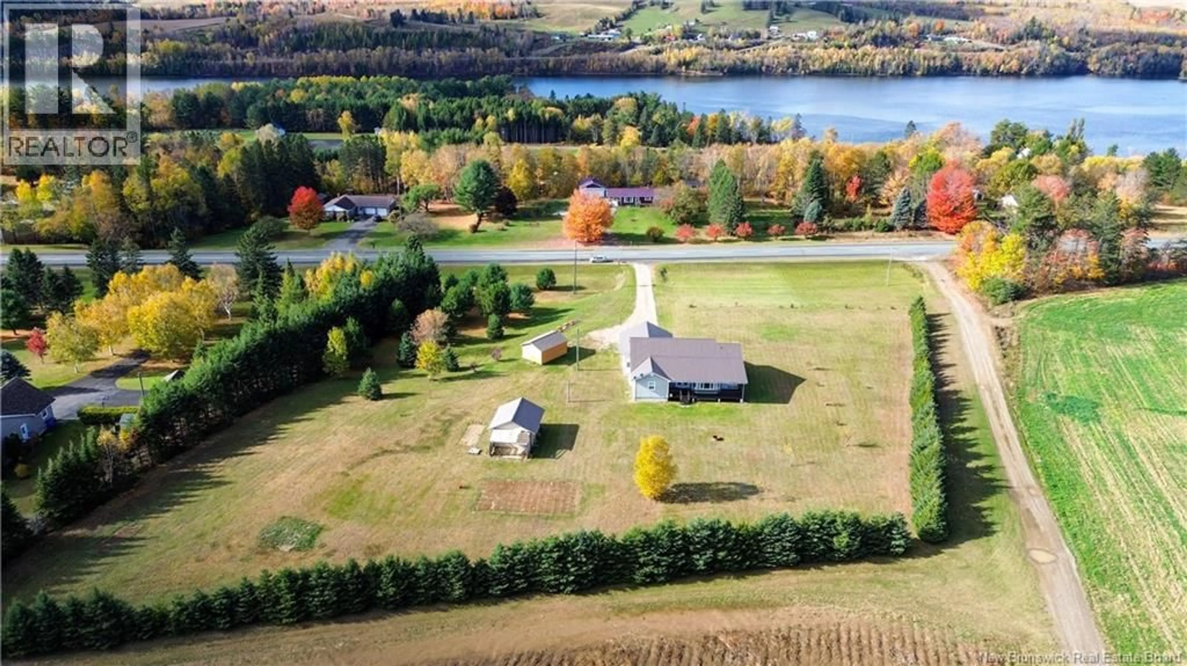 A pic from outside/outdoor area/front of a property/back of a property/a pic from drone, water/lake/river/ocean view for 10522 ROUTE 105, Upper Kent New Brunswick E7J2B4