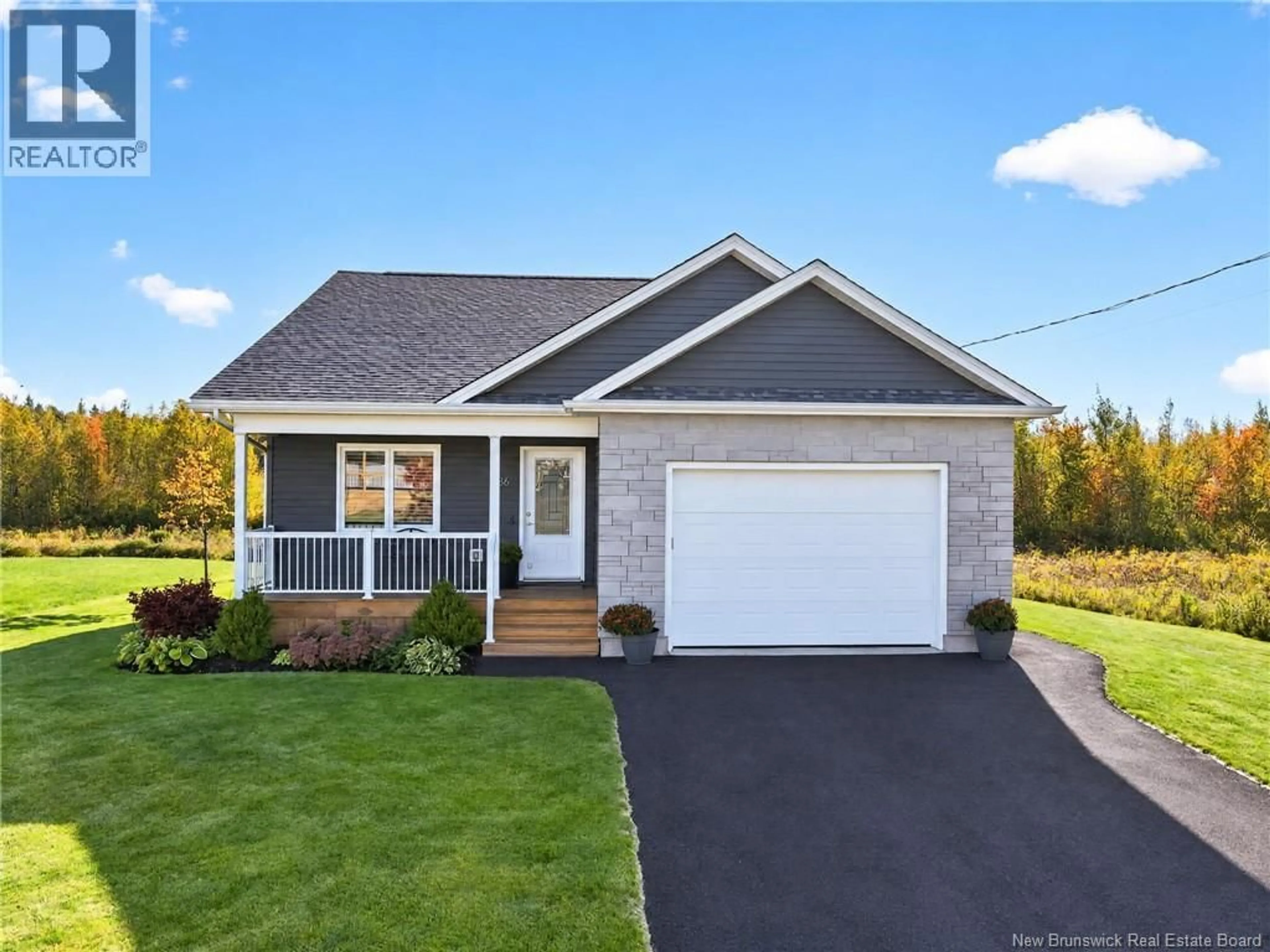 Home with vinyl exterior material, street for 36 LUXOR DRIVE, Riverview New Brunswick E1B0V7