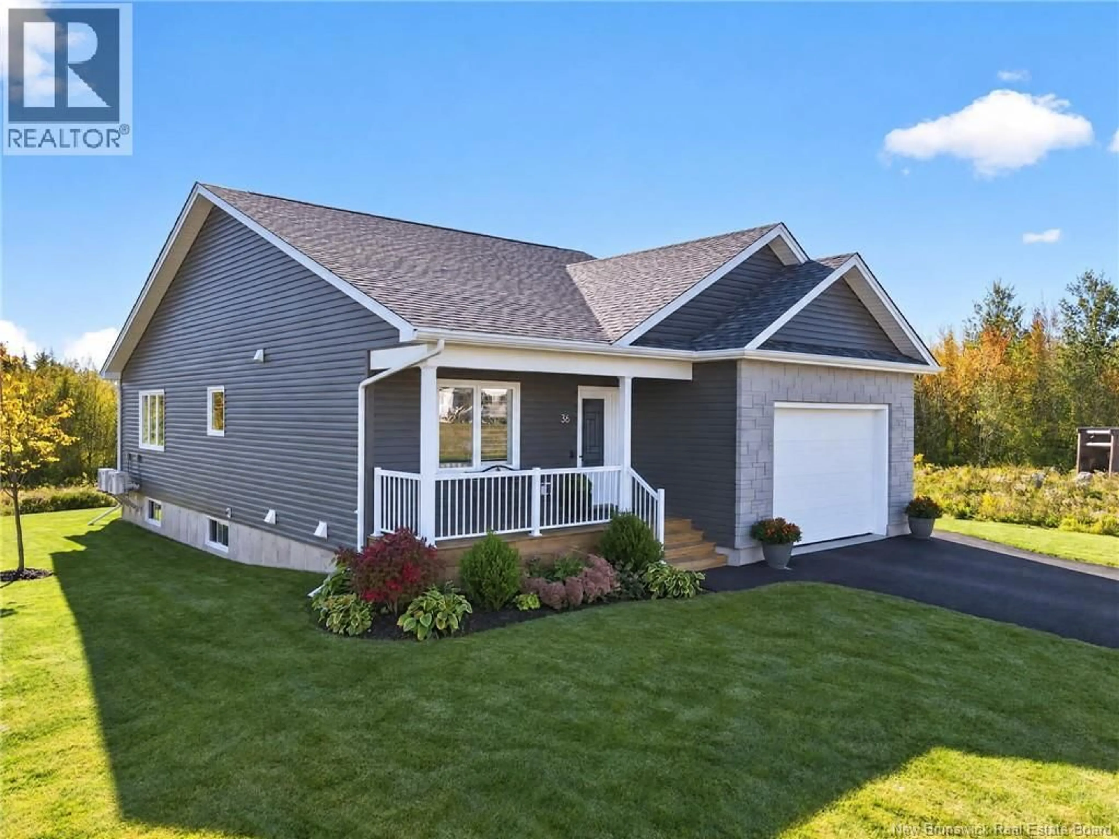 Home with vinyl exterior material, street for 36 LUXOR DRIVE, Riverview New Brunswick E1B0V7