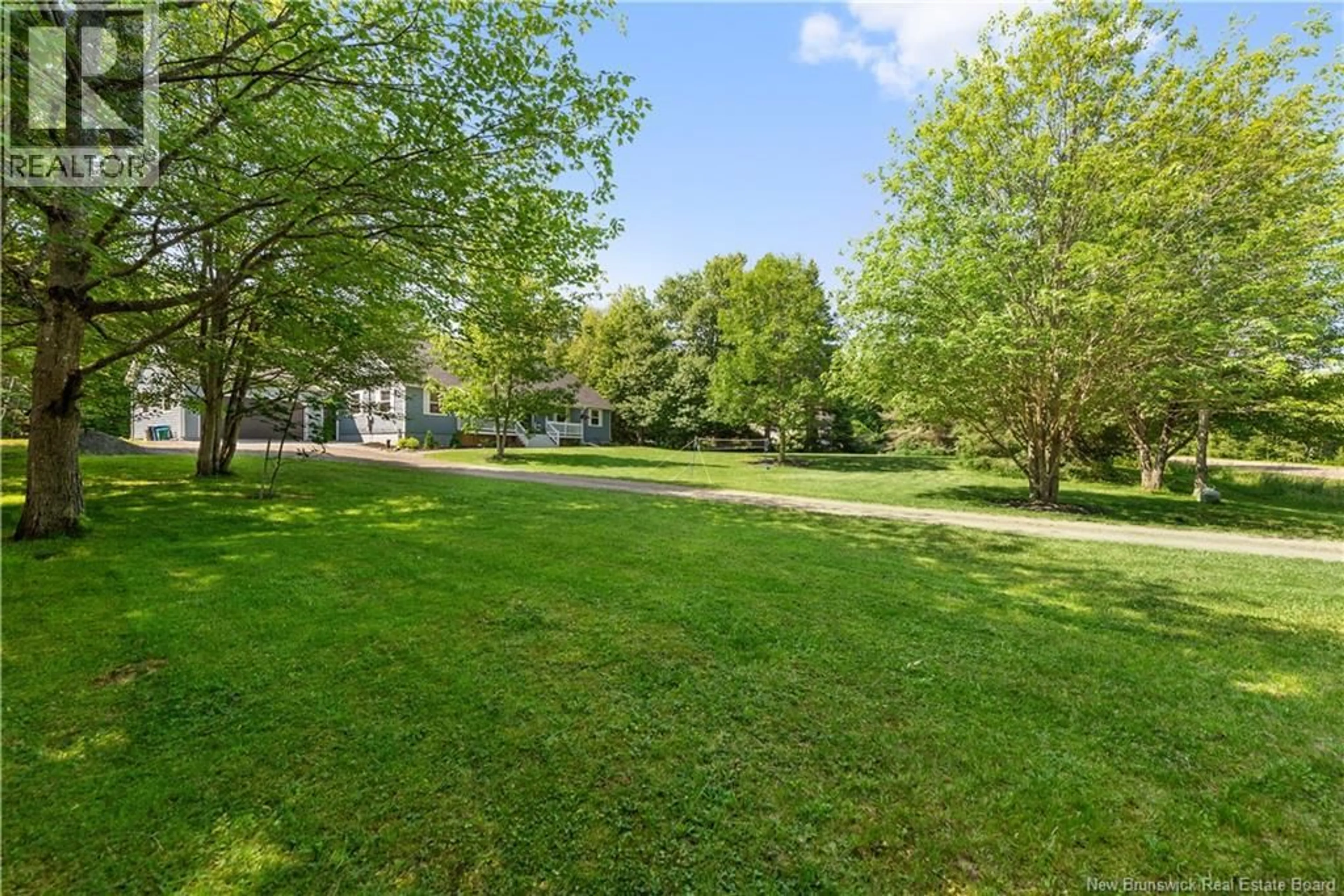 A pic from outside/outdoor area/front of a property/back of a property/a pic from drone, unknown for 32 RIVERBEND, Turtle Creek New Brunswick E1J2B3