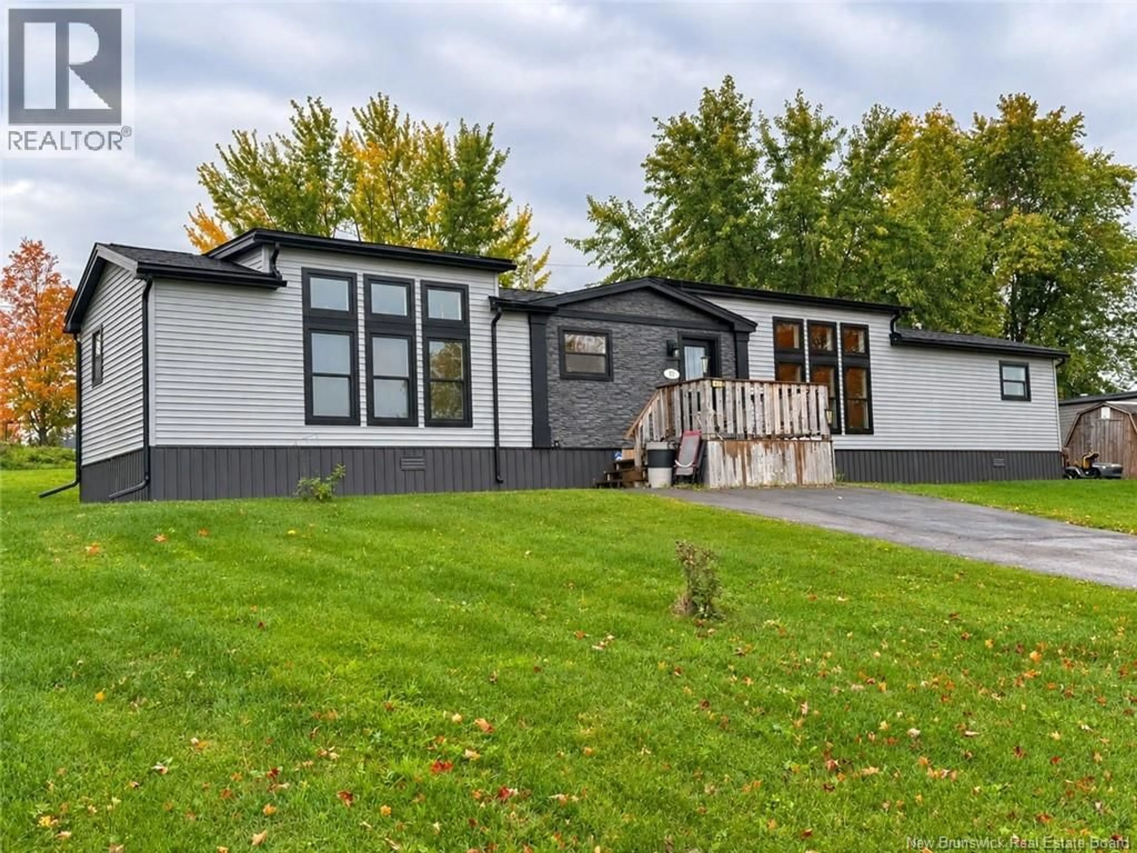 Home with vinyl exterior material, street for 61 MOSS LANE, Riverview New Brunswick E1B5A9