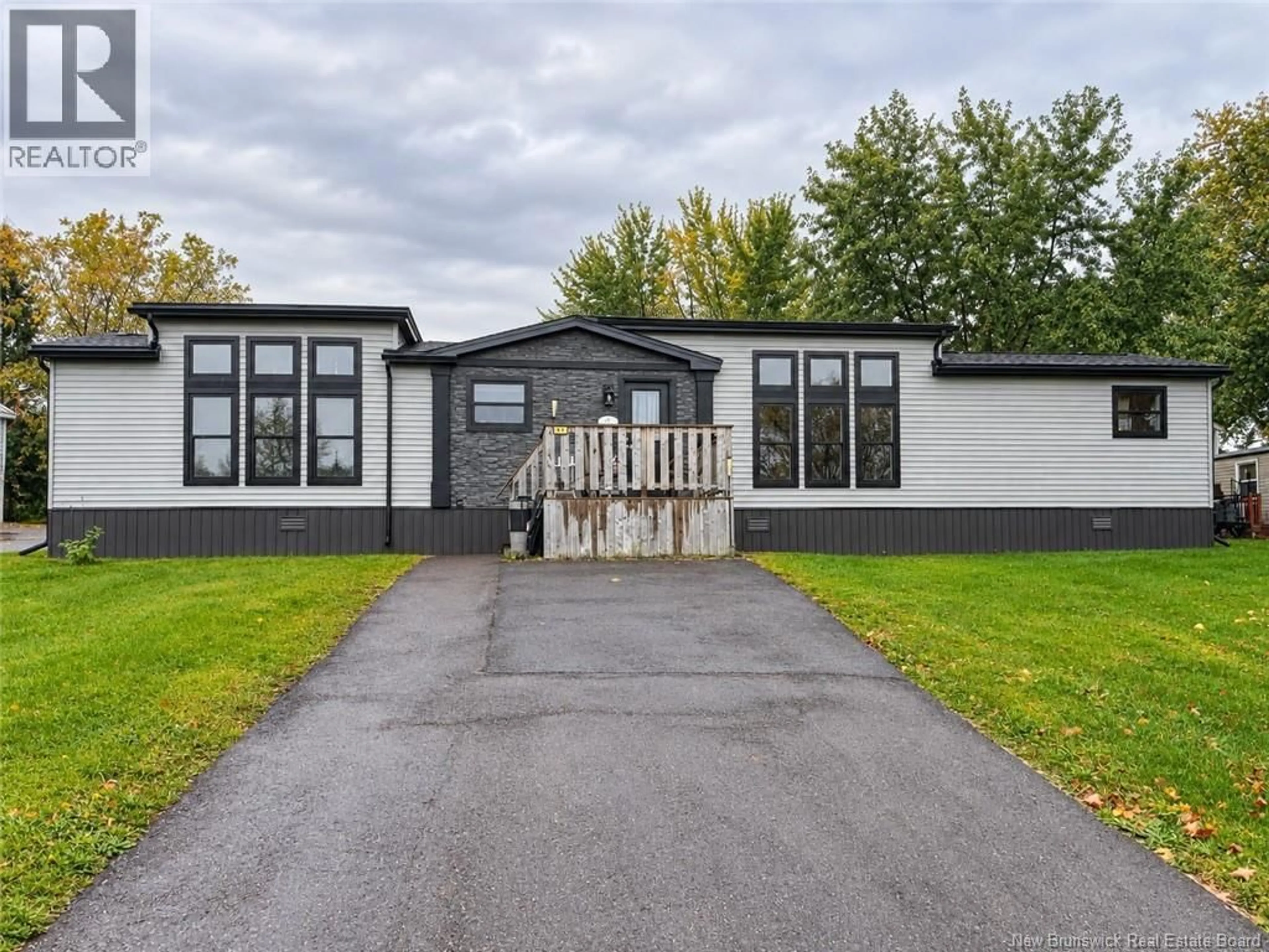 Home with vinyl exterior material, street for 61 MOSS LANE, Riverview New Brunswick E1B5A9
