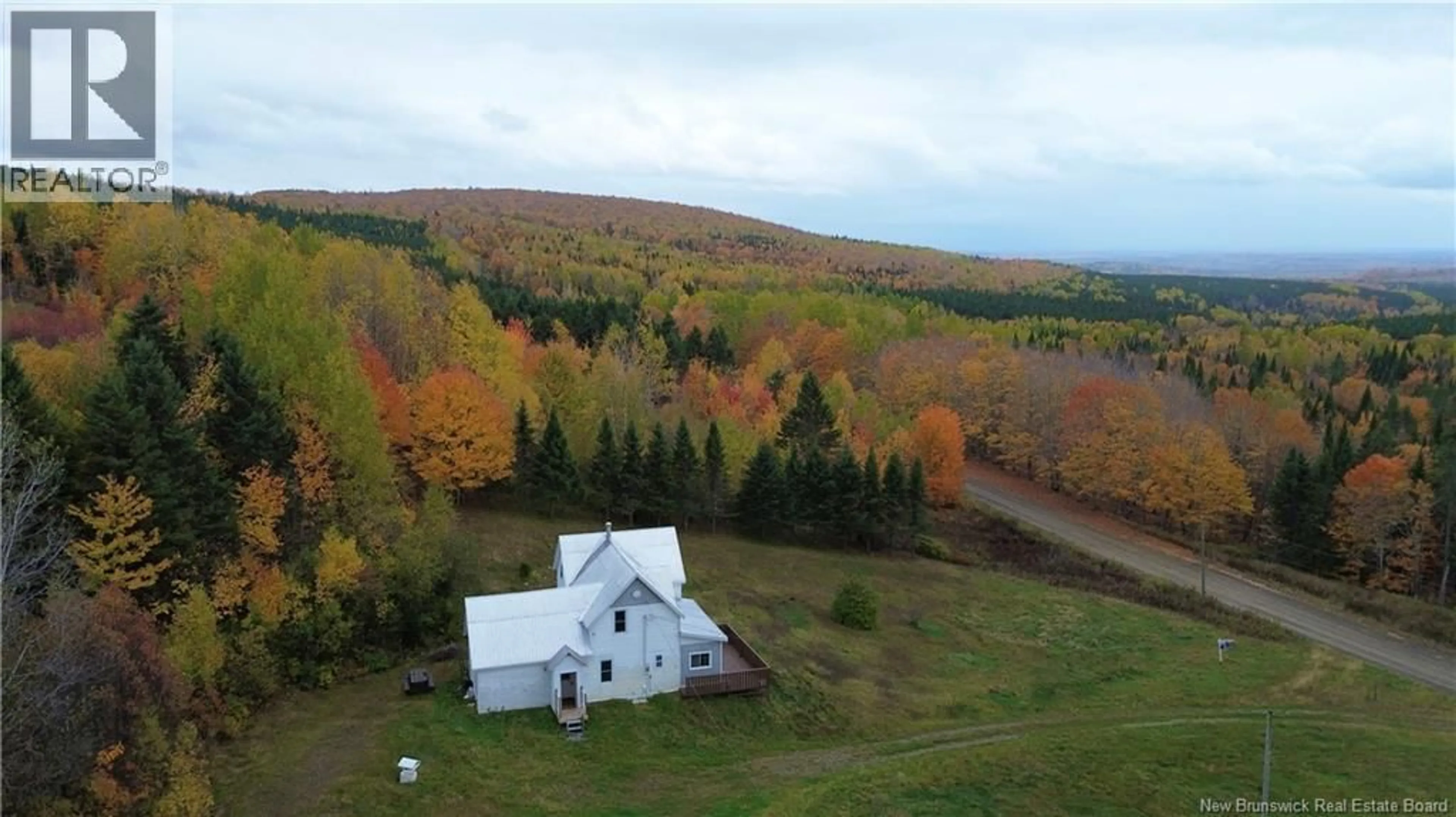 A pic from outside/outdoor area/front of a property/back of a property/a pic from drone, mountain view for 389 KNOWLESVILLE ROAD, Knowlesville New Brunswick E7L1M5