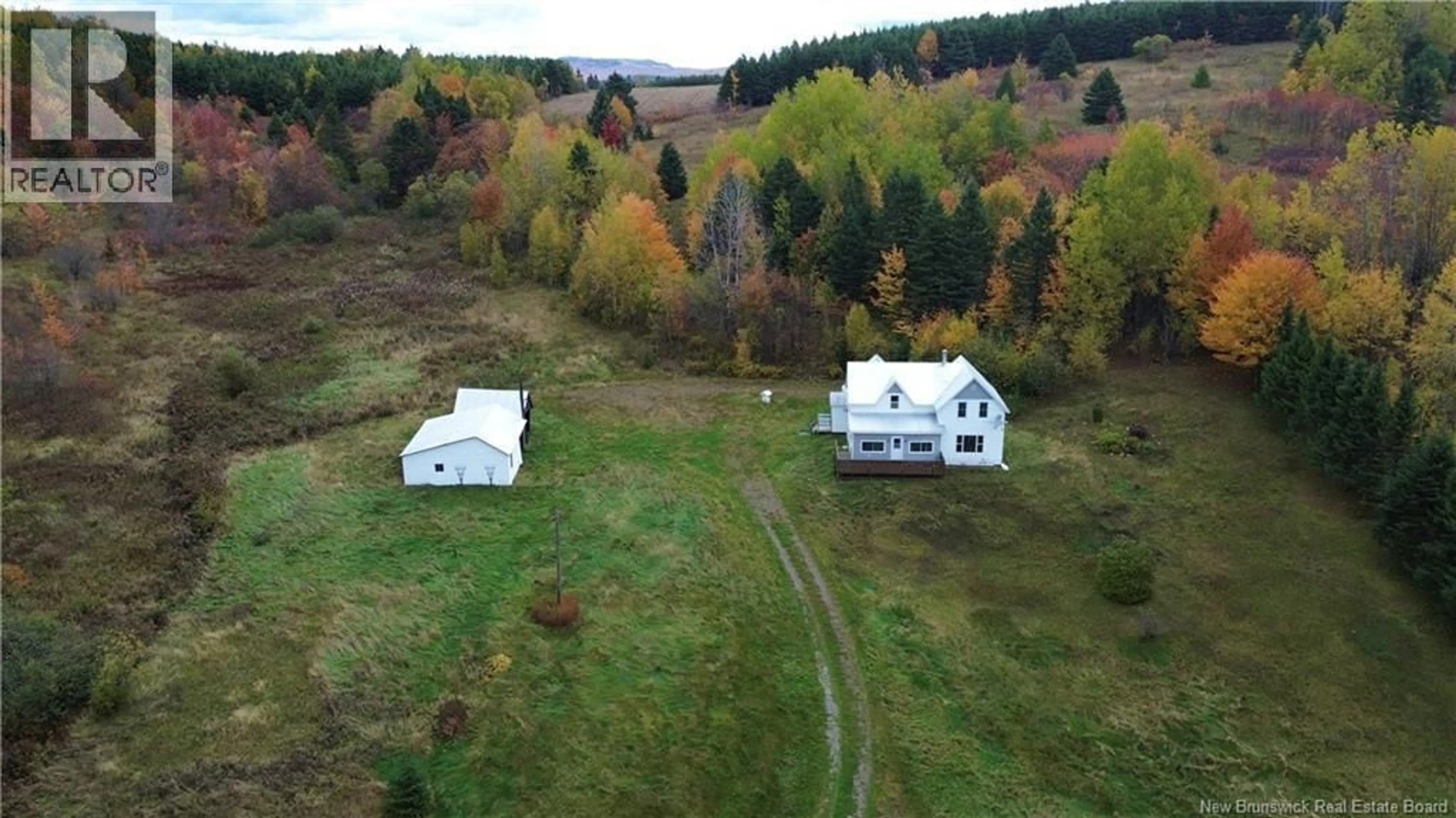 A pic from outside/outdoor area/front of a property/back of a property/a pic from drone, unknown for 389 KNOWLESVILLE ROAD, Knowlesville New Brunswick E7L1M5