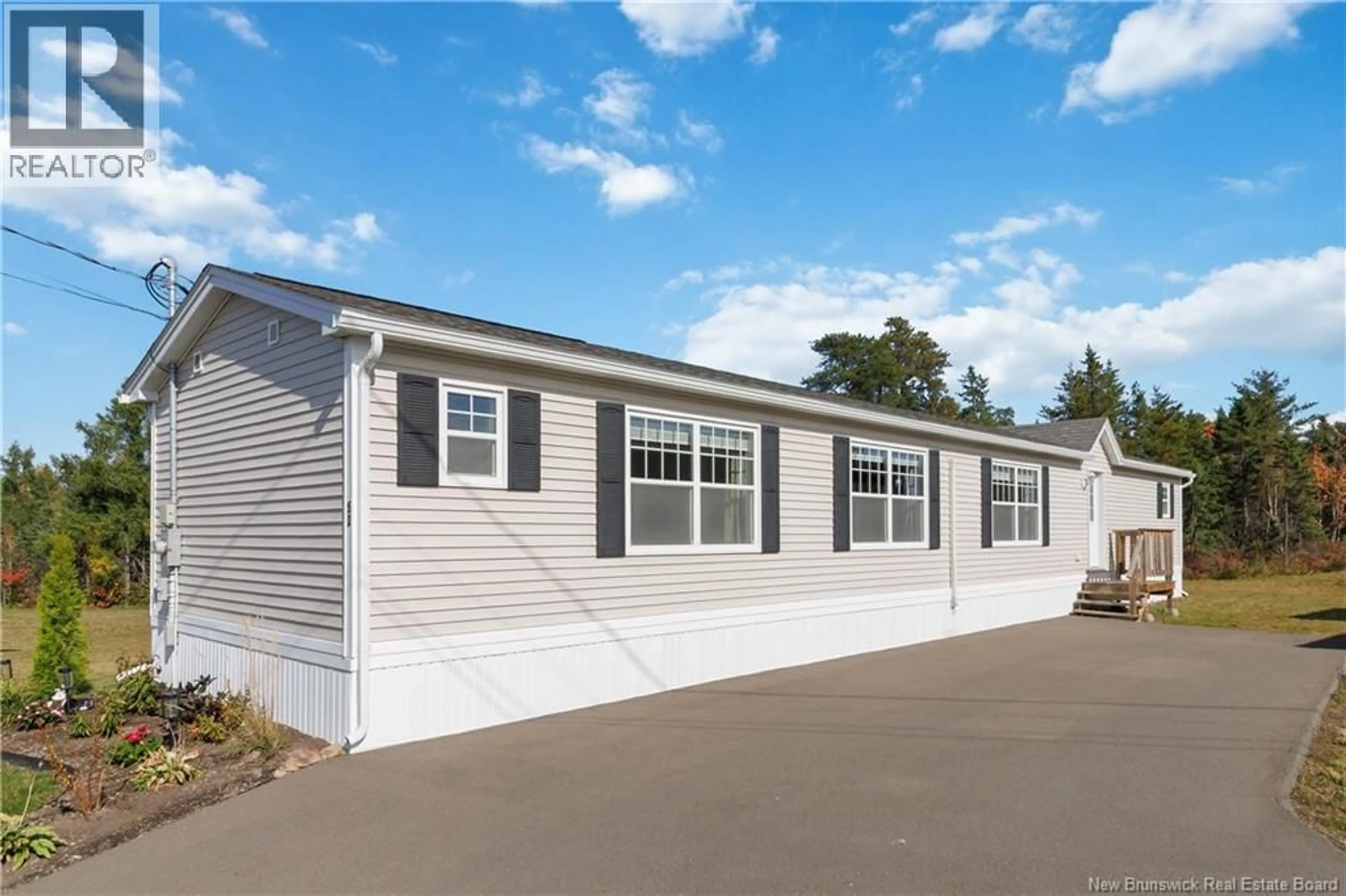 Home with vinyl exterior material, street for 52 CRANBROOK LANE, Riverview New Brunswick E1B0N6